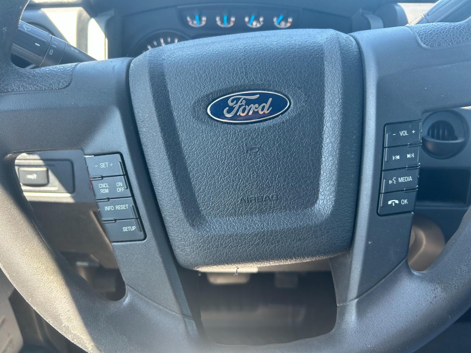 2014 White /Gray Ford F-150 STX 6.5-ft. Bed 2WD (1FTMF1CM0EK) with an 3.7L V6 DOHC 24V engine, 6-Speed Automatic transmission, located at 17760 Hwy 62, Morris, OK, 74445, (918) 733-4887, 35.609104, -95.877060 - 2014 FORD F-150 EXTENDED CAB HAS THE 3.7L V6 AND IS 2WD. THIS TRUCK IS A BI-FUEL THAT RUNS ON BOTH CNG (COMPRESSED NATURAL GAS) OR GASOLINE. FEATURES REMOTE KEYLESS ENTRY, POWER LOCKS, POWER WINDOWS, POWER MIRRORS, AM/FM STEREO, CD PLAYER, SIRIUS RADIO, AUX PORT, USB PORT, CLOTH INTERIOR, TRACTION C - Photo #14