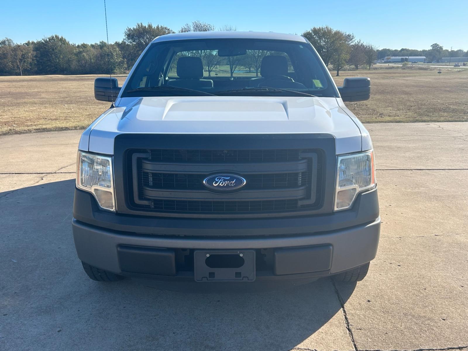 2014 White Ford F-150 STX 6.5-ft. Bed 2WD (1FTMF1CM5EK) with an 3.7L V6 DOHC 24V engine, 6-Speed Automatic transmission, located at 17760 Hwy 62, Morris, OK, 74445, (918) 733-4887, 35.609104, -95.877060 - Photo #1