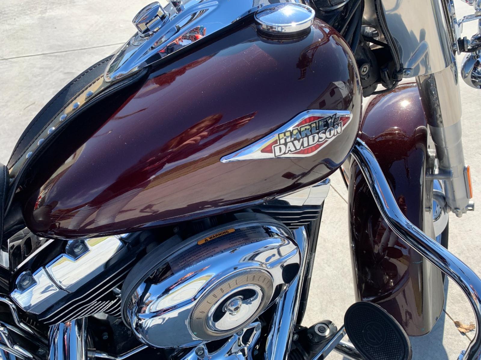 2009 PURPLE Harley-Davidson FLSTC - (1HD1BW5199Y) , located at 17760 HWY 62, MORRIS, 74445, 35.609104, -95.877060 - 2009 HARLEY- DAVIDSON FLSTC HERITAGE SOFTAIL 1584CC FEATURES CRUISE CONTROL, CHROME PASSING LAMPS, CHROME STAGGERED SHORTY EXHAUST WITH DUAL MUFFLERS, STUDDED LEATHER SADDLEBAGS, AND A FULL WINDSHIELD. A SMOOTH RIDE FOR LONG-RANGE TOURING COMFORT. IT RUNS GREAT !! ONLY 14,596 MILES. ** REBUILT TITLE - Photo #11