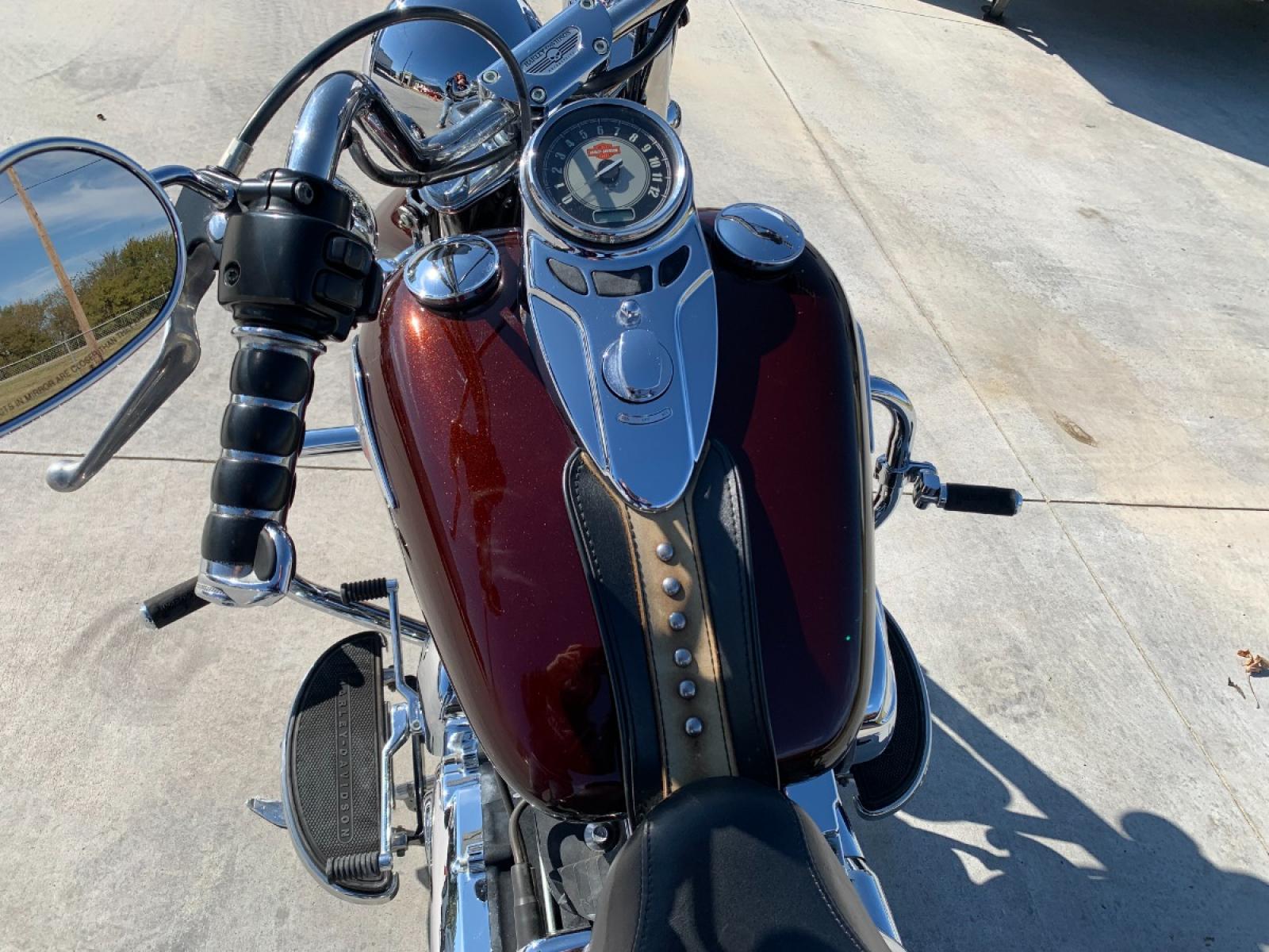 2009 PURPLE Harley-Davidson FLSTC - (1HD1BW5199Y) , located at 17760 HWY 62, MORRIS, 74445, 35.609104, -95.877060 - 2009 HARLEY- DAVIDSON FLSTC HERITAGE SOFTAIL 1584CC FEATURES CRUISE CONTROL, CHROME PASSING LAMPS, CHROME STAGGERED SHORTY EXHAUST WITH DUAL MUFFLERS, STUDDED LEATHER SADDLEBAGS, AND A FULL WINDSHIELD. A SMOOTH RIDE FOR LONG-RANGE TOURING COMFORT. IT RUNS GREAT !! ONLY 14,596 MILES. ** REBUILT TITLE - Photo #21