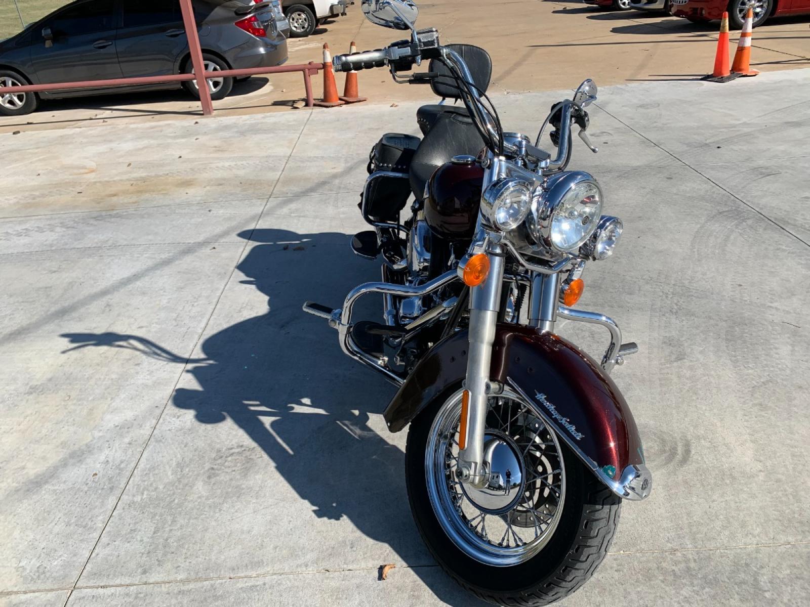 2009 PURPLE Harley-Davidson FLSTC - (1HD1BW5199Y) , located at 17760 HWY 62, MORRIS, 74445, 35.609104, -95.877060 - 2009 HARLEY- DAVIDSON FLSTC HERITAGE SOFTAIL 1584CC FEATURES CRUISE CONTROL, CHROME PASSING LAMPS, CHROME STAGGERED SHORTY EXHAUST WITH DUAL MUFFLERS, STUDDED LEATHER SADDLEBAGS, AND A FULL WINDSHIELD. A SMOOTH RIDE FOR LONG-RANGE TOURING COMFORT. IT RUNS GREAT !! ONLY 14,596 MILES. ** REBUILT TITLE - Photo #3