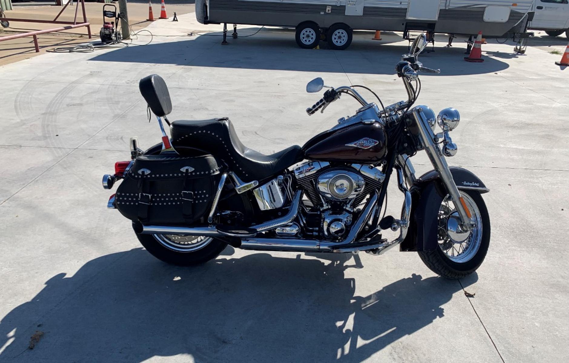 2009 PURPLE Harley-Davidson FLSTC - (1HD1BW5199Y) , located at 17760 HWY 62, MORRIS, 74445, 35.609104, -95.877060 - 2009 HARLEY- DAVIDSON FLSTC HERITAGE SOFTAIL 1584CC FEATURES CRUISE CONTROL, CHROME PASSING LAMPS, CHROME STAGGERED SHORTY EXHAUST WITH DUAL MUFFLERS, STUDDED LEATHER SADDLEBAGS, AND A FULL WINDSHIELD. A SMOOTH RIDE FOR LONG-RANGE TOURING COMFORT. IT RUNS GREAT !! ONLY 14,596 MILES. ** REBUILT TITLE - Photo #5