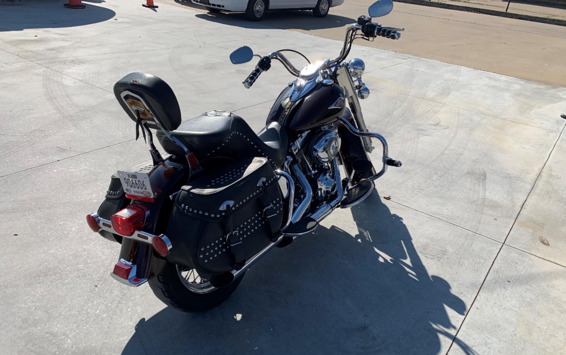 2009 PURPLE Harley-Davidson FLSTC - (1HD1BW5199Y) , located at 17760 HWY 62, MORRIS, 74445, 35.609104, -95.877060 - 2009 HARLEY- DAVIDSON FLSTC HERITAGE SOFTAIL 1584CC FEATURES CRUISE CONTROL, CHROME PASSING LAMPS, CHROME STAGGERED SHORTY EXHAUST WITH DUAL MUFFLERS, STUDDED LEATHER SADDLEBAGS, AND A FULL WINDSHIELD. A SMOOTH RIDE FOR LONG-RANGE TOURING COMFORT. IT RUNS GREAT !! ONLY 14,596 MILES. ** REBUILT TITLE - Photo #6
