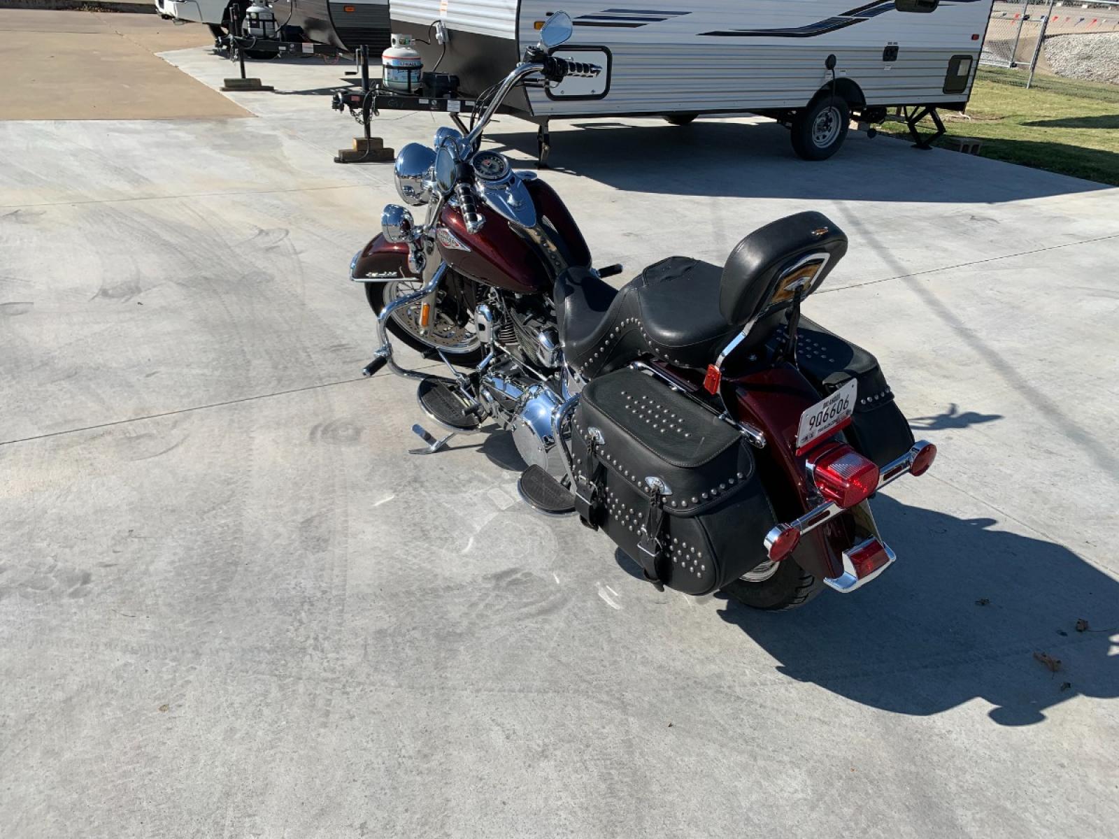 2009 PURPLE Harley-Davidson FLSTC - (1HD1BW5199Y) , located at 17760 HWY 62, MORRIS, 74445, 35.609104, -95.877060 - 2009 HARLEY- DAVIDSON FLSTC HERITAGE SOFTAIL 1584CC FEATURES CRUISE CONTROL, CHROME PASSING LAMPS, CHROME STAGGERED SHORTY EXHAUST WITH DUAL MUFFLERS, STUDDED LEATHER SADDLEBAGS, AND A FULL WINDSHIELD. A SMOOTH RIDE FOR LONG-RANGE TOURING COMFORT. IT RUNS GREAT !! ONLY 14,596 MILES. ** REBUILT TITLE - Photo #8