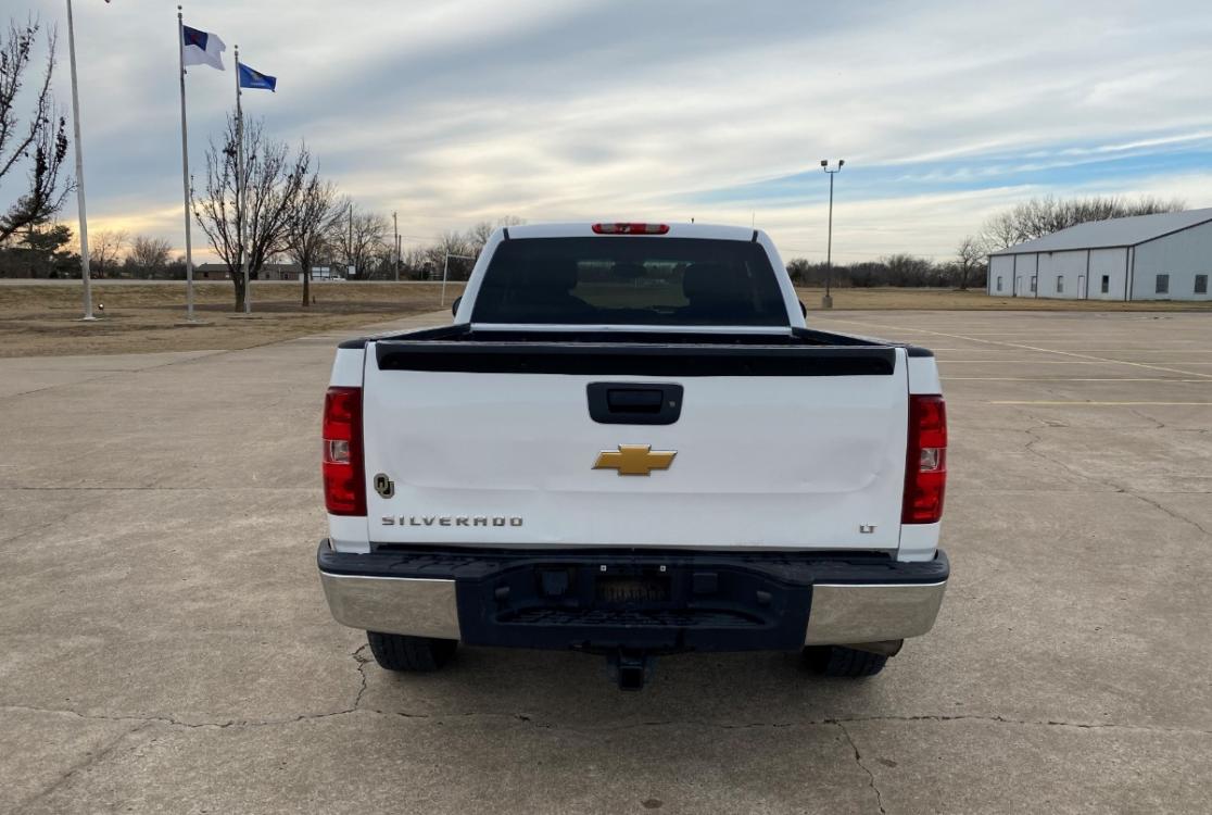 2012 White Chevrolet Silverado 1500 LT Ext. Cab Long Box 4WD (1GCRKSE71CZ) with an 5.3L V8 OHV 16V FFV engine, 6-Speed Automatic transmission, located at 17760 Hwy 62, Morris, OK, 74445, (918) 733-4887, 35.609104, -95.877060 - Photo #6