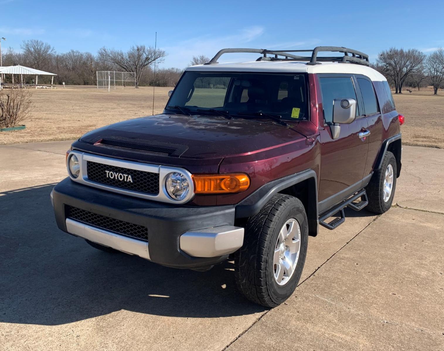2007 PURPLE Toyota FJ Cruiser 4WD AT (JTEBU11F170) with an 4.0L V6 DOHC 24V engine, 5-Speed Automatic Overdrive transmission, located at 17760 Hwy 62, Morris, OK, 74445, (918) 733-4887, 35.609104, -95.877060 - 2007 TOYOTA FJ CRUISER 4.0L V6 4WD AND RUNS ON GASOLINE. IT FEATURES POWER LOCKS, POWER MIRRORS, POWER WINDOWS, MANUAL SEATS, AM/FM STEREO, 6 DISC CD PLAYER, AUX, LEATHER SEATS, STEERING WHEEL CONTROLS, TILT WHEEL, CRUISE CONTROL, TRACTION CONTROL, PARKING ASSIST, SECOND-ROW FOLDING SEATS, OUTSIDE C - Photo #1