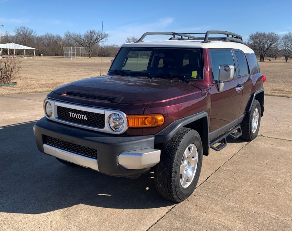 2007 PURPLE Toyota FJ Cruiser 4WD AT (JTEBU11F170) with an 3.4L V6 DOHC 24V engine, 5-Speed Automatic Overdrive transmission, located at 17760 Hwy 62, Morris, OK, 74445, (918) 733-4887, 35.609104, -95.877060 - 2007 TOYOTA FJ CRUISER 3.4L V6 4WD FEATURES POWER LOCKS, POWER MIRRORS, POWER WINDOWS, MANUAL SEATS, AM/FM STEREO, 6 DISC CD PLAYER, AUX, LEATHER SEATS, STEERING WHEEL CONTROLS, TILT WHEEL, CRUISE CONTROL, TRACTION CONTROL, PARKING ASSIST, SECOND ROW FOLDING SEATS, OUTSIDE COMPASS, FLOOR MATS, GO RH - Photo #1