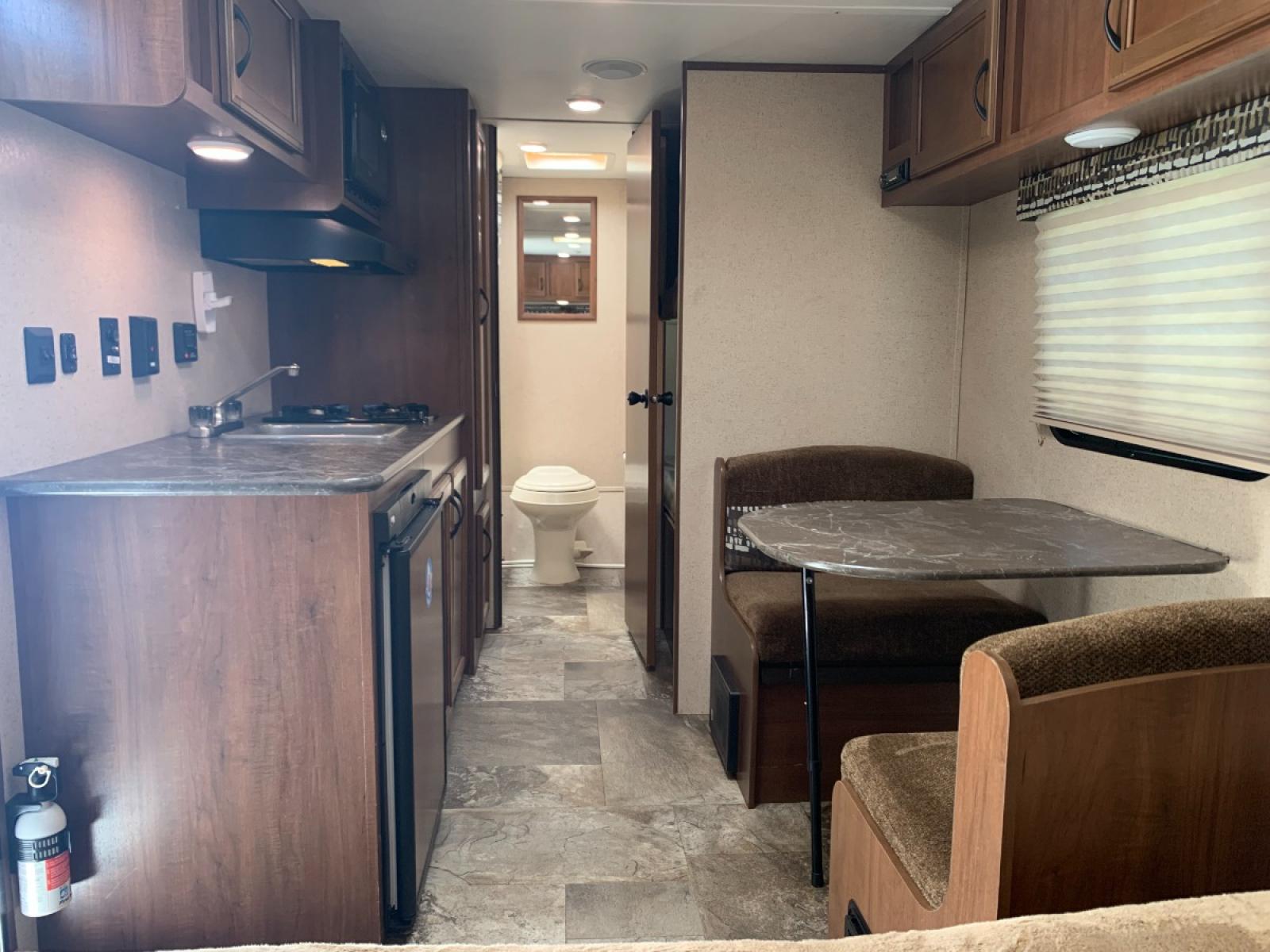 2016 TAN JAYCO Unknown 174BH (1UJBJ0AJ9G1) , located at 17760 Hwy 62, Morris, OK, 74445, 35.609104, -95.877060 - 2016 JAYCO JAY FLIGHT SLX 174BH IS 21.5FT LONG. THE OUTSIDE FEATURES A 10FT POWER AWNING, OUTSIDE STORAGE, OUTSIDE SPEAKERS, SINGLE AXLE, REAR MANUAL LEVELING JACKS, AND SPARE TIRE. AS YOU ENTER THE CAMPER, YOU WILL NOTICE THAT THERE ARE 5 WINDOWS SO YOU CAN LET NATURAL SUNLIGHT IN, THE QUEEN BE - Photo #20
