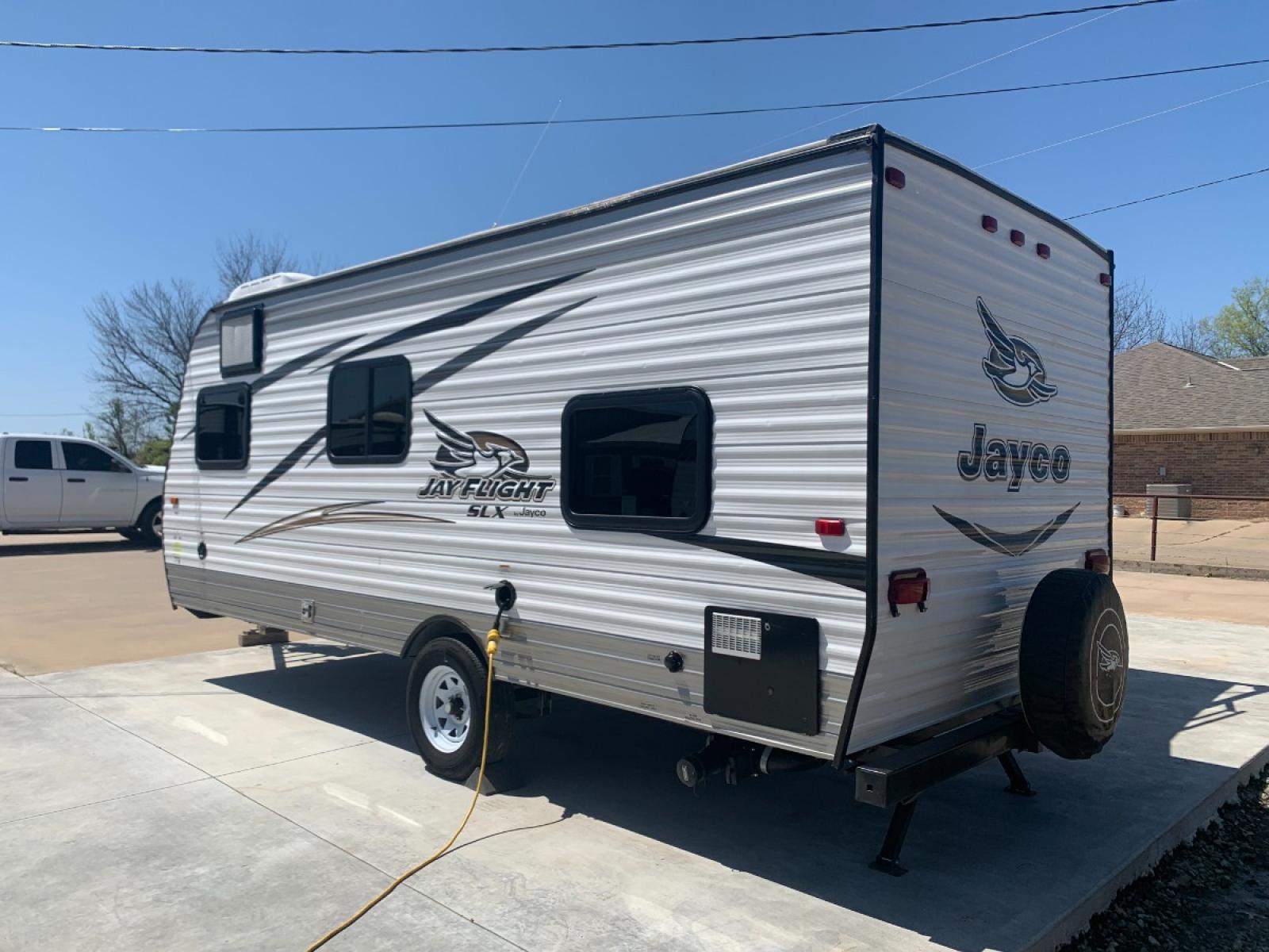 2016 TAN JAYCO Unknown 174BH (1UJBJ0AJ9G1) , located at 17760 Hwy 62, Morris, OK, 74445, 35.609104, -95.877060 - 2016 JAYCO JAY FLIGHT SLX 174BH IS 21.5FT LONG. THE OUTSIDE FEATURES A 10FT POWER AWNING, OUTSIDE STORAGE, OUTSIDE SPEAKERS, SINGLE AXLE, REAR MANUAL LEVELING JACKS, AND SPARE TIRE. AS YOU ENTER THE CAMPER, YOU WILL NOTICE THAT THERE ARE 5 WINDOWS SO YOU CAN LET NATURAL SUNLIGHT IN, THE QUEEN BE - Photo #4