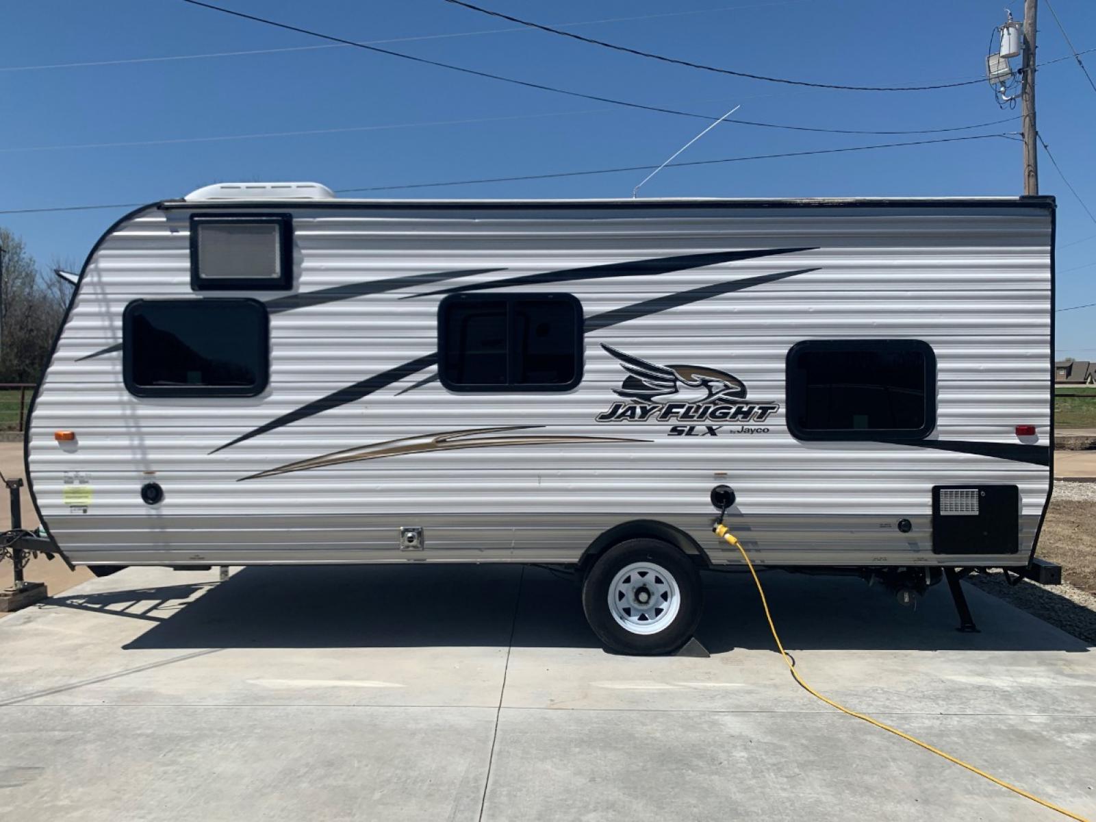 2016 TAN JAYCO Unknown 174BH (1UJBJ0AJ9G1) , located at 17760 Hwy 62, Morris, OK, 74445, 35.609104, -95.877060 - 2016 JAYCO JAY FLIGHT SLX 174BH IS 21.5FT LONG. THE OUTSIDE FEATURES A 10FT POWER AWNING, OUTSIDE STORAGE, OUTSIDE SPEAKERS, SINGLE AXLE, REAR MANUAL LEVELING JACKS, AND SPARE TIRE. AS YOU ENTER THE CAMPER, YOU WILL NOTICE THAT THERE ARE 5 WINDOWS SO YOU CAN LET NATURAL SUNLIGHT IN, THE QUEEN BE - Photo #5