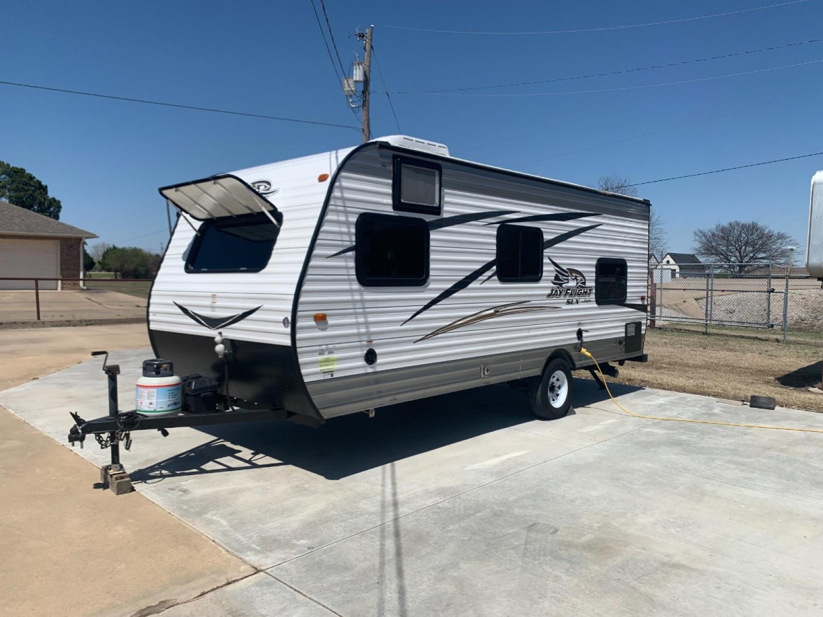 2016 TAN JAYCO Unknown 174BH (1UJBJ0AJ9G1) , located at 17760 Hwy 62, Morris, OK, 74445, 35.609104, -95.877060 - 2016 JAYCO JAY FLIGHT SLX 174BH IS 21.5FT LONG. THE OUTSIDE FEATURES A 10FT POWER AWNING, OUTSIDE STORAGE, OUTSIDE SPEAKERS, SINGLE AXLE, REAR MANUAL LEVELING JACKS, AND SPARE TIRE. AS YOU ENTER THE CAMPER, YOU WILL NOTICE THAT THERE ARE 5 WINDOWS SO YOU CAN LET NATURAL SUNLIGHT IN, THE QUEEN BE - Photo #6
