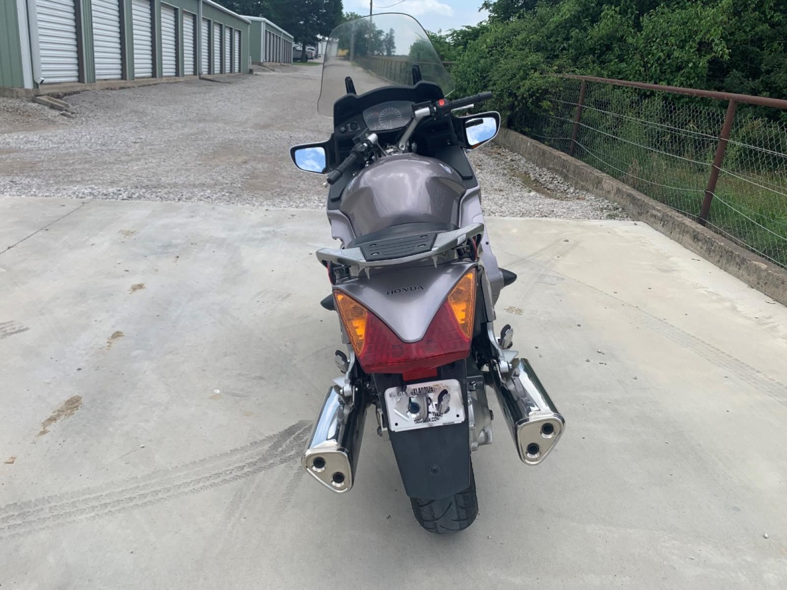 2003 Silver Honda ST1300 ST1300 (JH2SC51103M) with an 1261CC engine, 5 SPEED transmission, located at 17760 HWY 62, MORRIS, 74445, 35.609104, -95.877060 - 2003 HONDA ST1300 1261CC 5-SPEED TRANSMISSION WITH AN ELECTRIC START, POWER-ADJUSTABLE LIGHTS, POWER-ADJUSTABLE WINDSHIELD, NICE CLEAN TOURING SPORTS BIKE. ONLY 17,093 MILES, MARATHON TIRES, IT HAS REBUILT TITLE DUE TO A SMALL ACCIDENT. LIGHT SCRAPES AS SHOWN IN PICTURES. WE OFFER A FREE CARFAX ON - Photo #5