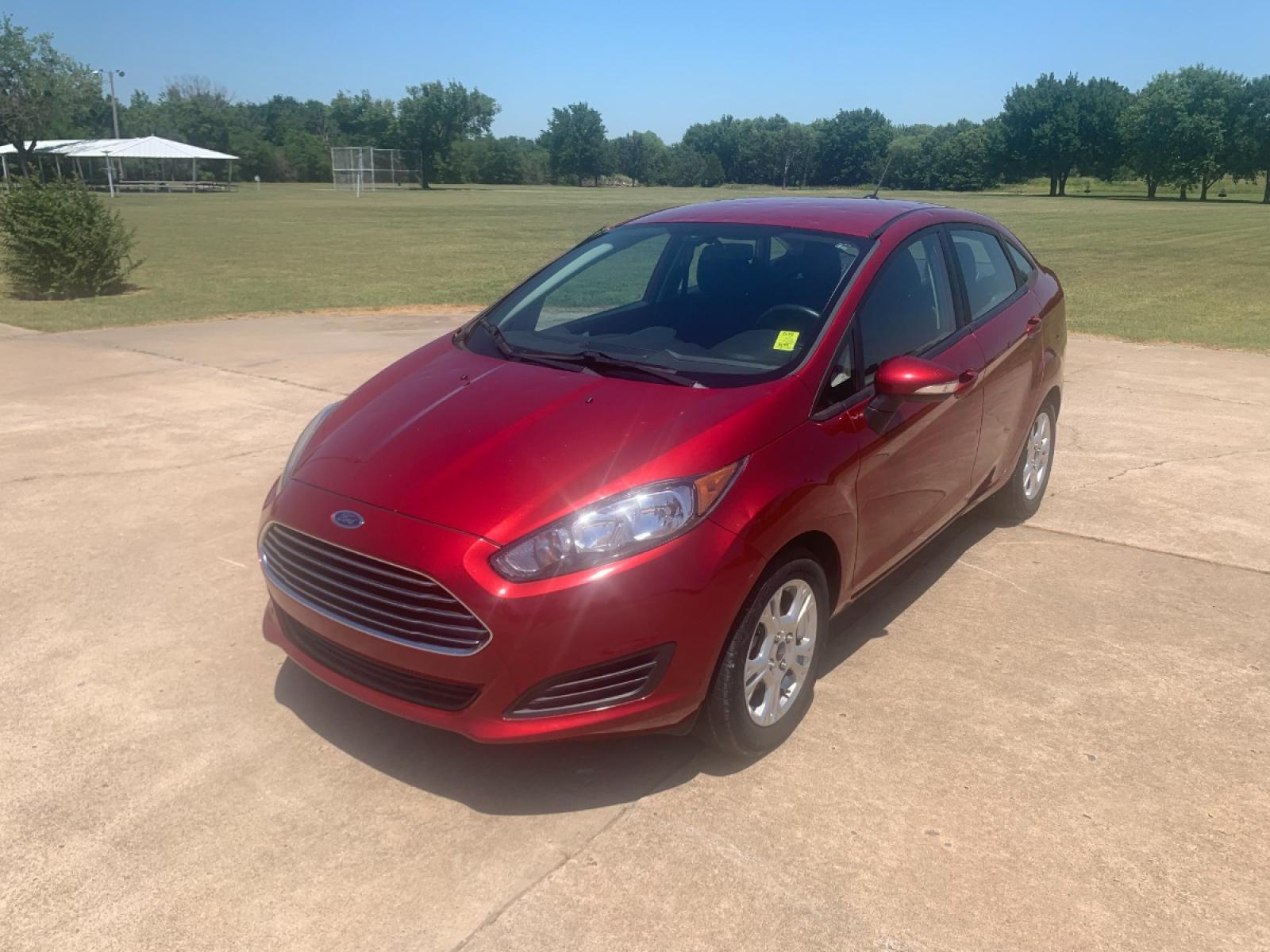 2014 RED Ford Fiesta SE Sedan (3FADP4BJ6EM) with an 1.6L L4 DOHC 16V engine, located at 17760 Hwy 62, Morris, OK, 74445, (918) 733-4887, 35.609104, -95.877060 - 2014 FORD FIESTA SE 1.6L 4 CYLINDER FWD, FEATURES KEYLESS ENTRY REMOTE, POWER LOCKS, POWER WINDOWS, POWER MIRRORS, MANUAL SEATS, AM/FM STEREO, CD PLAYER, BLUETOOTH, CLOTH SEATS, CRUISE CONTROL, HANDS-FREE CALLING, VOICE COMMAND CONTROL, MULTI-FUNCTION STEERING WHEEL CONTROLS. 108,726 MILES 195/60R15 - Photo #1