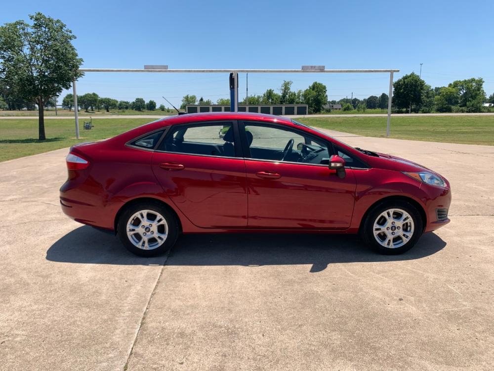 2014 RED Ford Fiesta SE Sedan (3FADP4BJ6EM) with an 1.6L L4 DOHC 16V engine, located at 17760 Hwy 62, Morris, OK, 74445, (918) 733-4887, 35.609104, -95.877060 - 2014 FORD FIESTA SE 1.6L 4 CYLINDER FWD, FEATURES KEYLESS ENTRY REMOTE, POWER LOCKS, POWER WINDOWS, POWER MIRRORS, MANUAL SEATS, AM/FM STEREO, CD PLAYER, BLUETOOTH, CLOTH SEATS, CRUISE CONTROL, HANDS-FREE CALLING, VOICE COMMAND CONTROL, MULTI-FUNCTION STEERING WHEEL CONTROLS. 108,726 MILES 195/60R15 - Photo #4