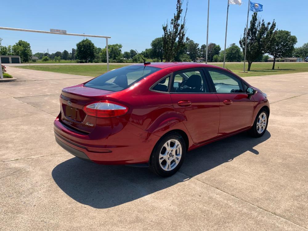 2014 RED Ford Fiesta SE Sedan (3FADP4BJ6EM) with an 1.6L L4 DOHC 16V engine, located at 17760 Hwy 62, Morris, OK, 74445, (918) 733-4887, 35.609104, -95.877060 - 2014 FORD FIESTA SE 1.6L 4 CYLINDER FWD, FEATURES KEYLESS ENTRY REMOTE, POWER LOCKS, POWER WINDOWS, POWER MIRRORS, MANUAL SEATS, AM/FM STEREO, CD PLAYER, BLUETOOTH, CLOTH SEATS, CRUISE CONTROL, HANDS-FREE CALLING, VOICE COMMAND CONTROL, MULTI-FUNCTION STEERING WHEEL CONTROLS. 108,726 MILES 195/60R15 - Photo #5