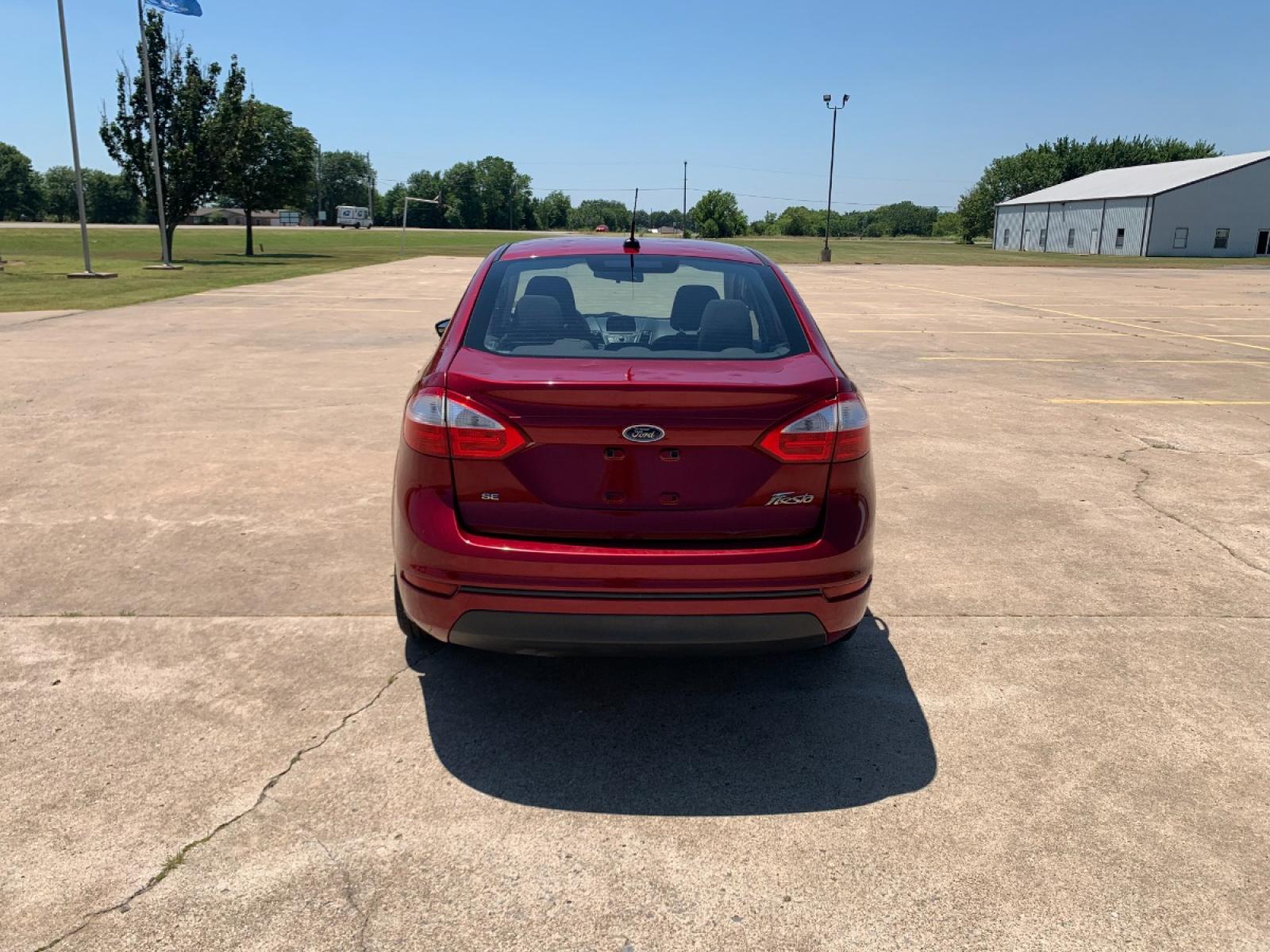 2014 RED Ford Fiesta SE Sedan (3FADP4BJ6EM) with an 1.6L L4 DOHC 16V engine, located at 17760 Hwy 62, Morris, OK, 74445, (918) 733-4887, 35.609104, -95.877060 - Photo #6