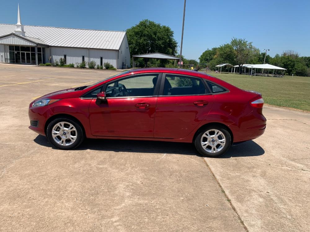 2014 RED Ford Fiesta SE Sedan (3FADP4BJ6EM) with an 1.6L L4 DOHC 16V engine, located at 17760 Hwy 62, Morris, OK, 74445, (918) 733-4887, 35.609104, -95.877060 - 2014 FORD FIESTA SE 1.6L 4 CYLINDER FWD, FEATURES KEYLESS ENTRY REMOTE, POWER LOCKS, POWER WINDOWS, POWER MIRRORS, MANUAL SEATS, AM/FM STEREO, CD PLAYER, BLUETOOTH, CLOTH SEATS, CRUISE CONTROL, HANDS-FREE CALLING, VOICE COMMAND CONTROL, MULTI-FUNCTION STEERING WHEEL CONTROLS. 108,726 MILES 195/60R15 - Photo #8
