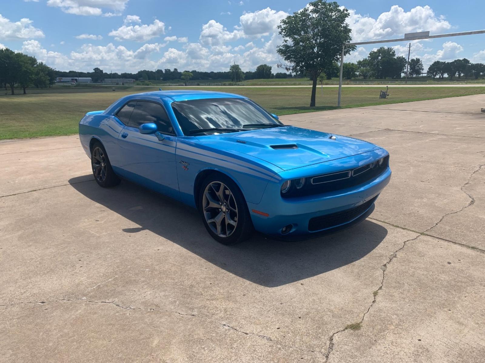 2015 BLUE Dodge Challenger R/T Plus (2C3CDZBTXFH) with an 5.7L V8 OHV 16V engine, AUTOMATIC transmission, located at 17760 Hwy 62, Morris, OK, 74445, (918) 733-4887, 35.609104, -95.877060 - THE 2015 DODGE CHALLENGER RT HAS A 5.7L HEMI RWD. RUNS ON GASOLINE. FEATURES A REMOTE KEYLESS ENTRY, POWER LOCKS, POWER SEATS, POWER WINDOWS, POWER MIRRORS, AM/FM STEREO, SXM RADIO, TOUCHSCREEN, BLUETOOTH, AUX PORT, USB PORT, MP3 PLAYER, UCONNECT, SUEDE, LEATHER SEATS, TRACTION CONTROL, CRUISE CONTR - Photo #3