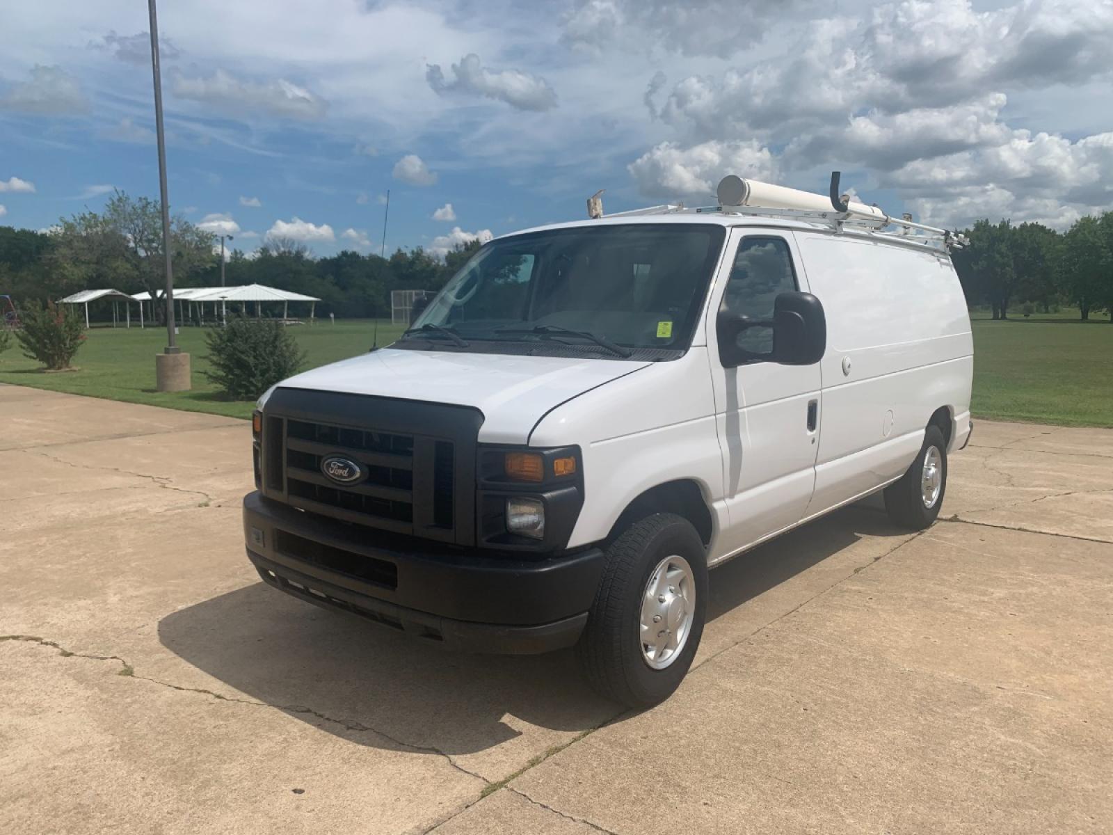 2011 White Ford E-Series Van E-250 (1FTNE2EL6BD) with an 5.4L V8 SOHC 16V engine, 4-Speed Automatic transmission, located at 17760 Hwy 62, Morris, OK, 74445, (918) 733-4887, 35.609104, -95.877060 - Photo #1