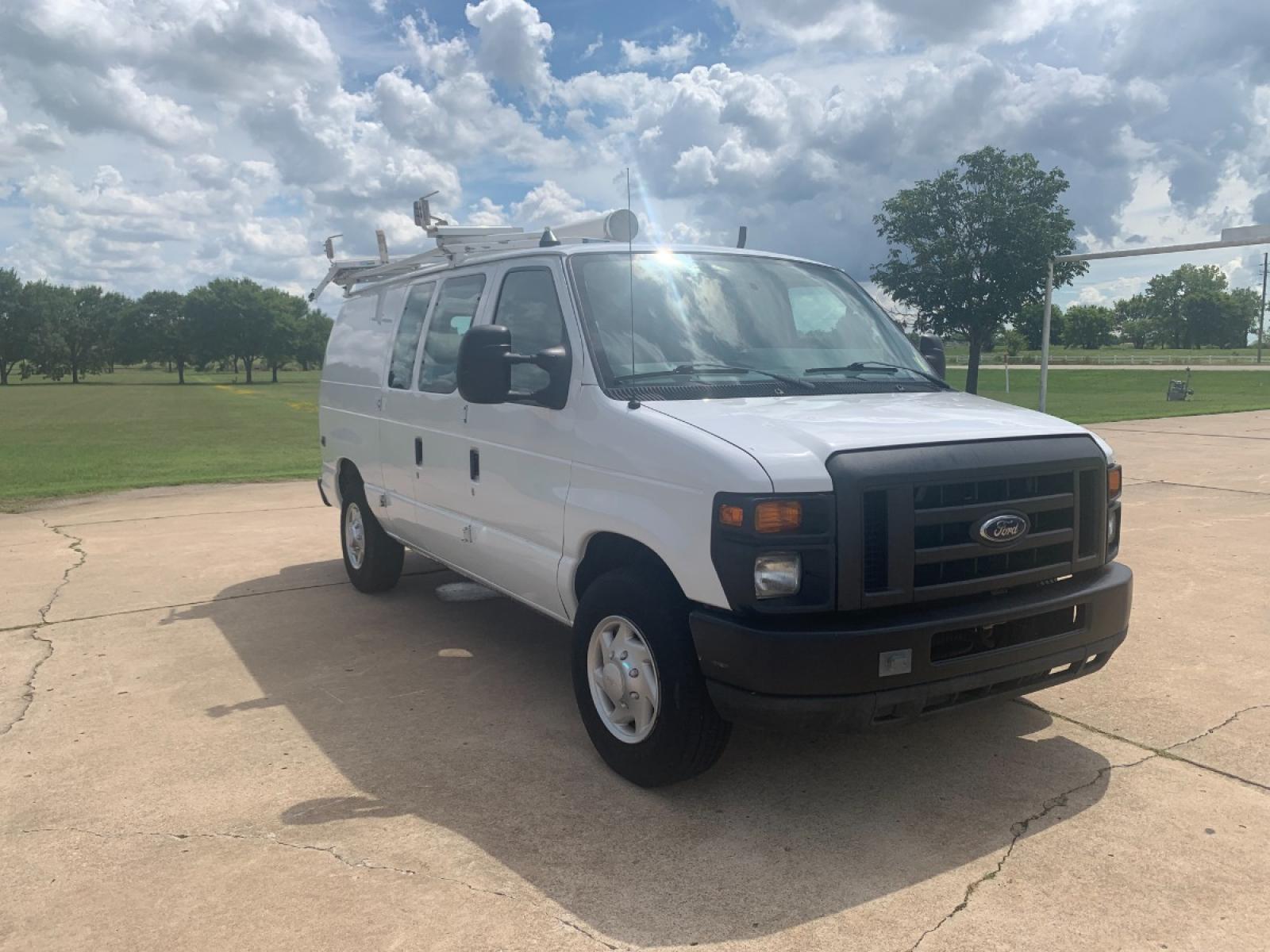 2011 White Ford E-Series Van E-250 (1FTNE2EL6BD) with an 5.4L V8 SOHC 16V engine, 4-Speed Automatic transmission, located at 17760 Hwy 62, Morris, OK, 74445, (918) 733-4887, 35.609104, -95.877060 - 2011 FORD E-SERIES VAN E-250 5.4 V8 DEDICATED CNG (COMPRESSED NATURAL GAS) DOES NOT RUN ON GASOLINE. THE FORD E-SERIES VAN FEATURES MANUAL SEATS, MANUAL LOCKS, MANUAL WINDOWS, MANUAL MIRRORS, FRONT HEAT AND AIR, AM/FM RADIO, LEATHER SEATS, STEEL SHELVES, SPLIT SWING-OUT RIGHT DOORS, AND PLENTY OF SP - Photo #3