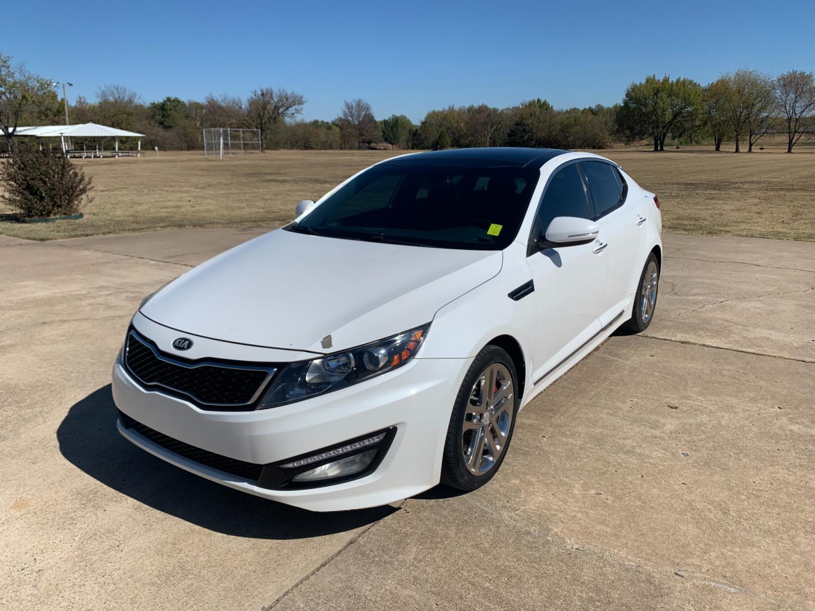 2013 White Kia Optima SXL (5XXGR4A60DG) with an 2.0L L4 DOHC 16V TURBO engine, 6-Speed Automatic transmission, located at 17760 Hwy 62, Morris, OK, 74445, (918) 733-4887, 35.609104, -95.877060 - 2013 KIA OPTIMA SXL HAS A 2.0L 4-CYLINDER AND IS FWD, RUNS ON GASOLINE, AND GETS 30MPG. THIS KIA WILL SAVE MONEY AT THE PUMP. IT FEATURES A KEYLESS ENTRY REMOTE, POWER LOCKS, POWER WINDOWS, POWER SEATS, POWER MIRRORS, AM/FM STEREO, INFINITY SOUND SYSTEM, CD PLAYER, USB PORT, SIRUS RADIO, LEATHER SEA - Photo #1