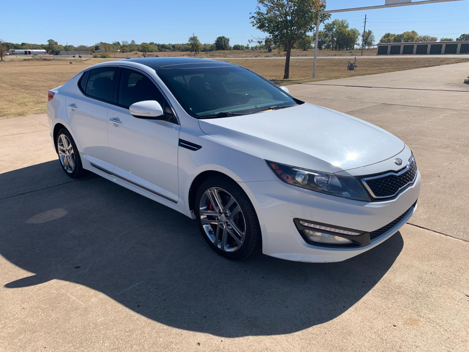 2013 White Kia Optima SXL (5XXGR4A60DG) with an 2.0L L4 DOHC 16V TURBO engine, 6-Speed Automatic transmission, located at 17760 Hwy 62, Morris, OK, 74445, (918) 733-4887, 35.609104, -95.877060 - 2013 KIA OPTIMA SXL HAS A 2.0L 4-CYLINDER AND IS FWD, RUNS ON GASOLINE, AND GETS 30MPG. THIS KIA WILL SAVE MONEY AT THE PUMP. IT FEATURES A KEYLESS ENTRY REMOTE, POWER LOCKS, POWER WINDOWS, POWER SEATS, POWER MIRRORS, AM/FM STEREO, INFINITY SOUND SYSTEM, CD PLAYER, USB PORT, SIRUS RADIO, LEATHER SEA - Photo #3