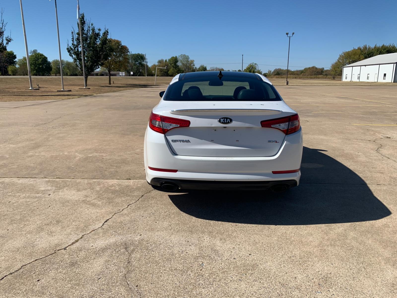 2013 White Kia Optima SXL (5XXGR4A60DG) with an 2.0L L4 DOHC 16V TURBO engine, 6-Speed Automatic transmission, located at 17760 Hwy 62, Morris, OK, 74445, (918) 733-4887, 35.609104, -95.877060 - 2013 KIA OPTIMA SXL HAS A 2.0L 4-CYLINDER AND IS FWD, RUNS ON GASOLINE, AND GETS 30MPG. THIS KIA WILL SAVE MONEY AT THE PUMP. IT FEATURES A KEYLESS ENTRY REMOTE, POWER LOCKS, POWER WINDOWS, POWER SEATS, POWER MIRRORS, AM/FM STEREO, INFINITY SOUND SYSTEM, CD PLAYER, USB PORT, SIRUS RADIO, LEATHER SEA - Photo #6
