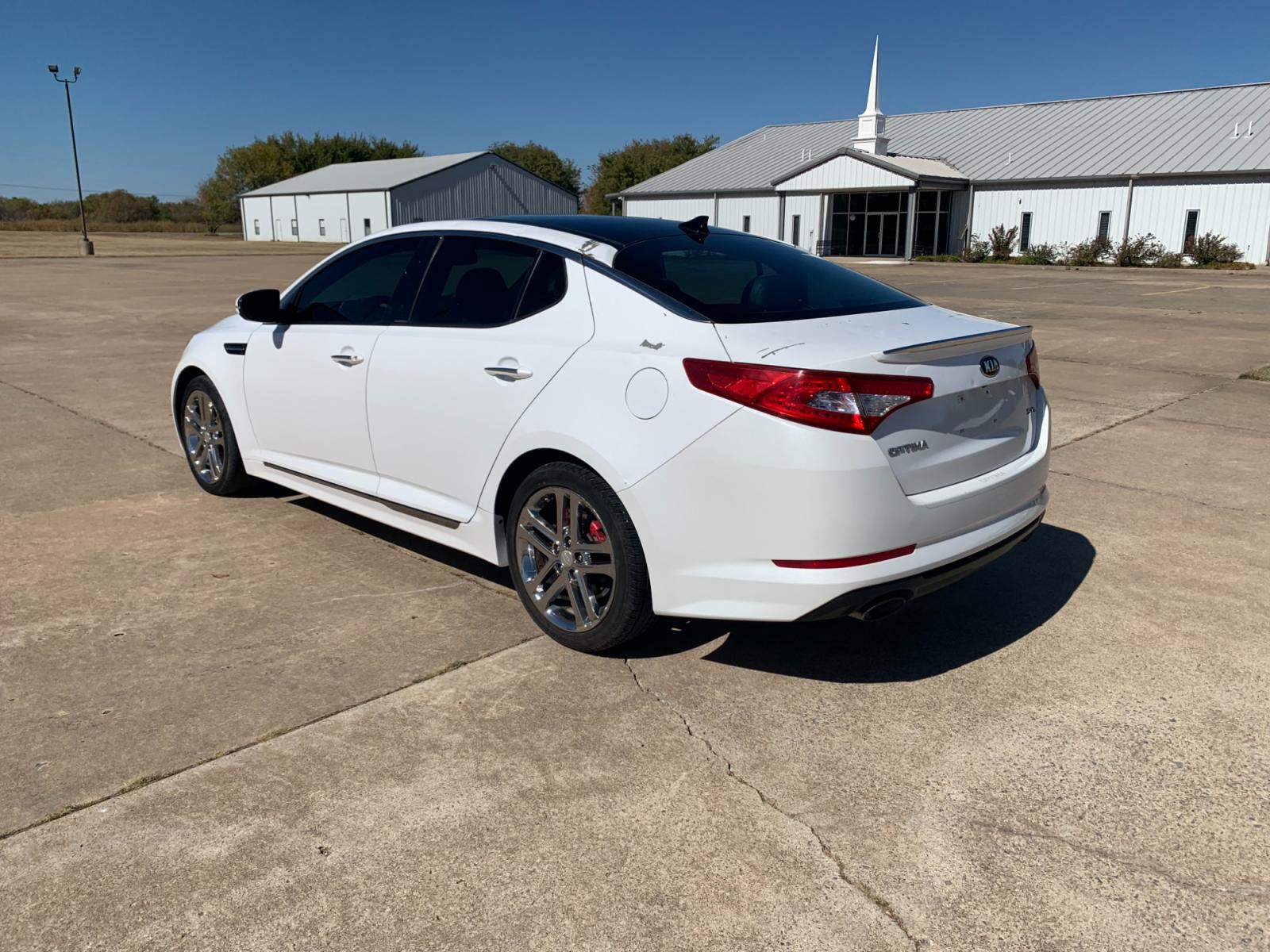 2013 White Kia Optima SXL (5XXGR4A60DG) with an 2.0L L4 DOHC 16V TURBO engine, 6-Speed Automatic transmission, located at 17760 Hwy 62, Morris, OK, 74445, (918) 733-4887, 35.609104, -95.877060 - 2013 KIA OPTIMA SXL HAS A 2.0L 4-CYLINDER AND IS FWD, RUNS ON GASOLINE, AND GETS 30MPG. THIS KIA WILL SAVE MONEY AT THE PUMP. IT FEATURES A KEYLESS ENTRY REMOTE, POWER LOCKS, POWER WINDOWS, POWER SEATS, POWER MIRRORS, AM/FM STEREO, INFINITY SOUND SYSTEM, CD PLAYER, USB PORT, SIRUS RADIO, LEATHER SEA - Photo #7