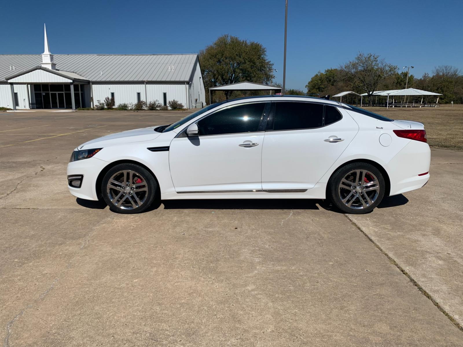 2013 White Kia Optima SXL (5XXGR4A60DG) with an 2.0L L4 DOHC 16V TURBO engine, 6-Speed Automatic transmission, located at 17760 Hwy 62, Morris, OK, 74445, (918) 733-4887, 35.609104, -95.877060 - 2013 KIA OPTIMA SXL HAS A 2.0L 4-CYLINDER AND IS FWD, RUNS ON GASOLINE, AND GETS 30MPG. THIS KIA WILL SAVE MONEY AT THE PUMP. IT FEATURES A KEYLESS ENTRY REMOTE, POWER LOCKS, POWER WINDOWS, POWER SEATS, POWER MIRRORS, AM/FM STEREO, INFINITY SOUND SYSTEM, CD PLAYER, USB PORT, SIRUS RADIO, LEATHER SEA - Photo #8