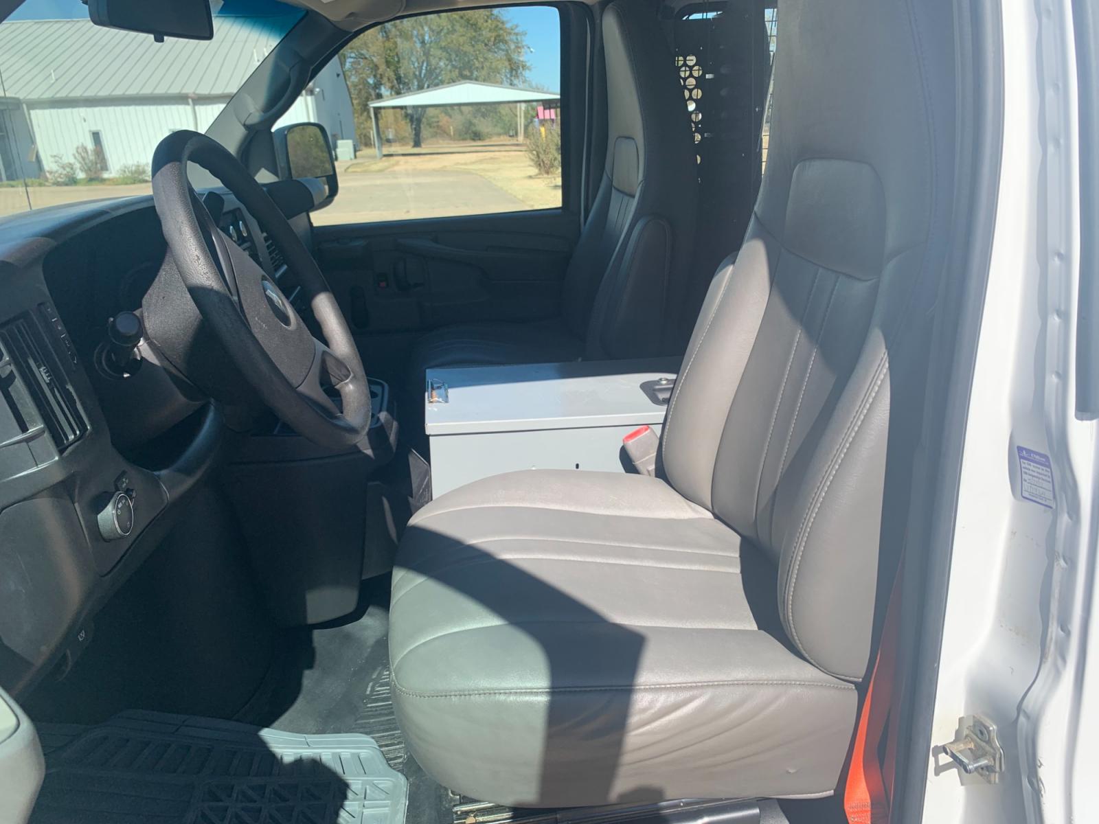 2013 White Chevrolet Express 2500 Cargo (1GCWGFCB9D1) with an 6.0L V8 OHV 16V FFV engine, 6-Speed Automatic transmission, located at 17760 Hwy 62, Morris, OK, 74445, (918) 733-4887, 35.609104, -95.877060 - 2013 CHEVROLET EXPRESS CARGO VAN 6.0L V8 RWD FEATURING POWER LOCKS, MANUAL WINDOWS, MANUAL MIRRORS, MANUAL SEATS, AM/FM STEREO, LEATHER SEATS, LEATHER-WRAPPED STEERING WHEEL, TACHOMETER, TRACTION CONTROL, LOCKING METAL CONSOLE, STEEL SHELVES, SPLIT SWING-OUT RIGHT DOORS, RUBBER MATS, LOAD-BEARING E - Photo #8