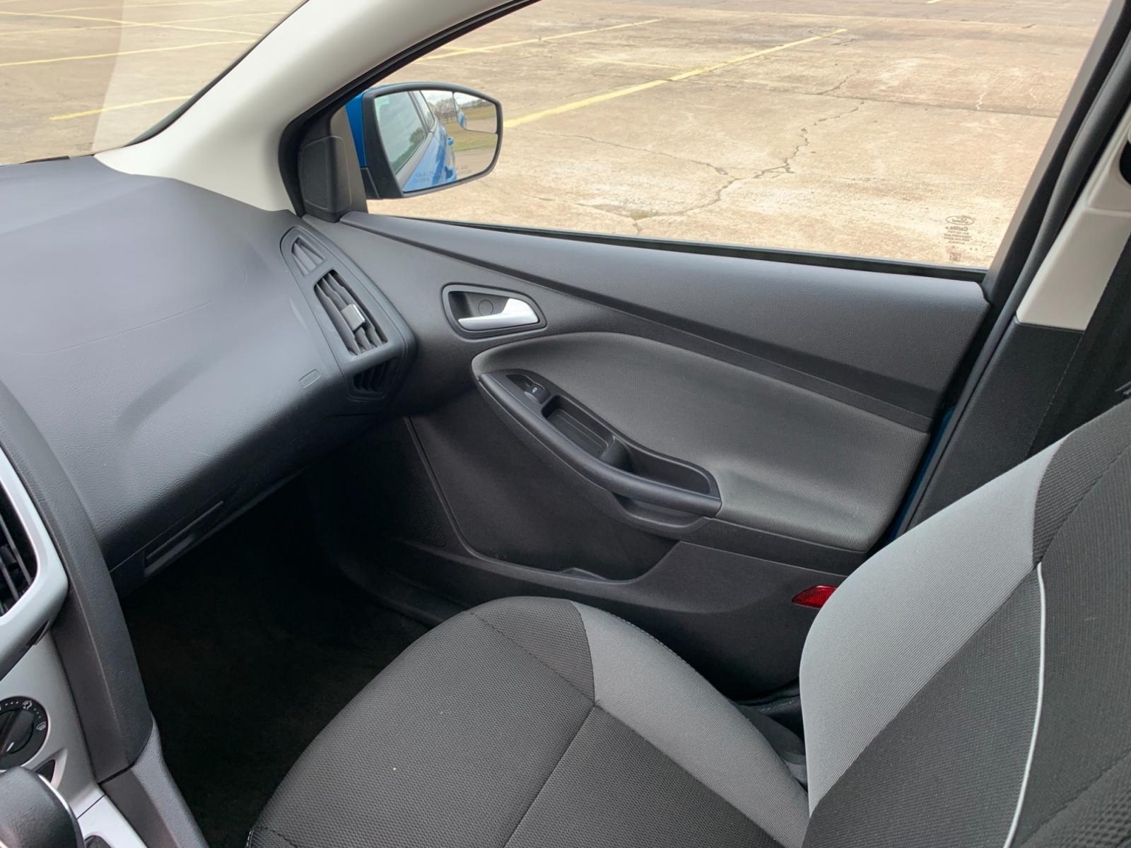 2014 BLUE Ford Focus SE Sedan (1FADP3F25EL) with an 2.0L L4 DOHC 16V engine, AUTOMATIC transmission, located at 17760 Hwy 62, Morris, OK, 74445, (918) 733-4887, 35.609104, -95.877060 - 2014 FORD FOCUS SE HAS A 2.0L 4-CYLINDER FEATURES POWER REMOTE LOCKING SYSTEM, POWER WINDOWS, POWER LOCKS, POWER WINDOWS, POWER MIRRORS, CD PLAYER, AM/FM STEREO, AUX PORT, USB PORT, CLOTH INTERIOR, BLUETOOTH, CRUISE CONTROL, MULTIFUNCTION STEERING WHEEL CONTROL, VOICE COMMAND CONTROL. DOES HAVE REB - Photo #9