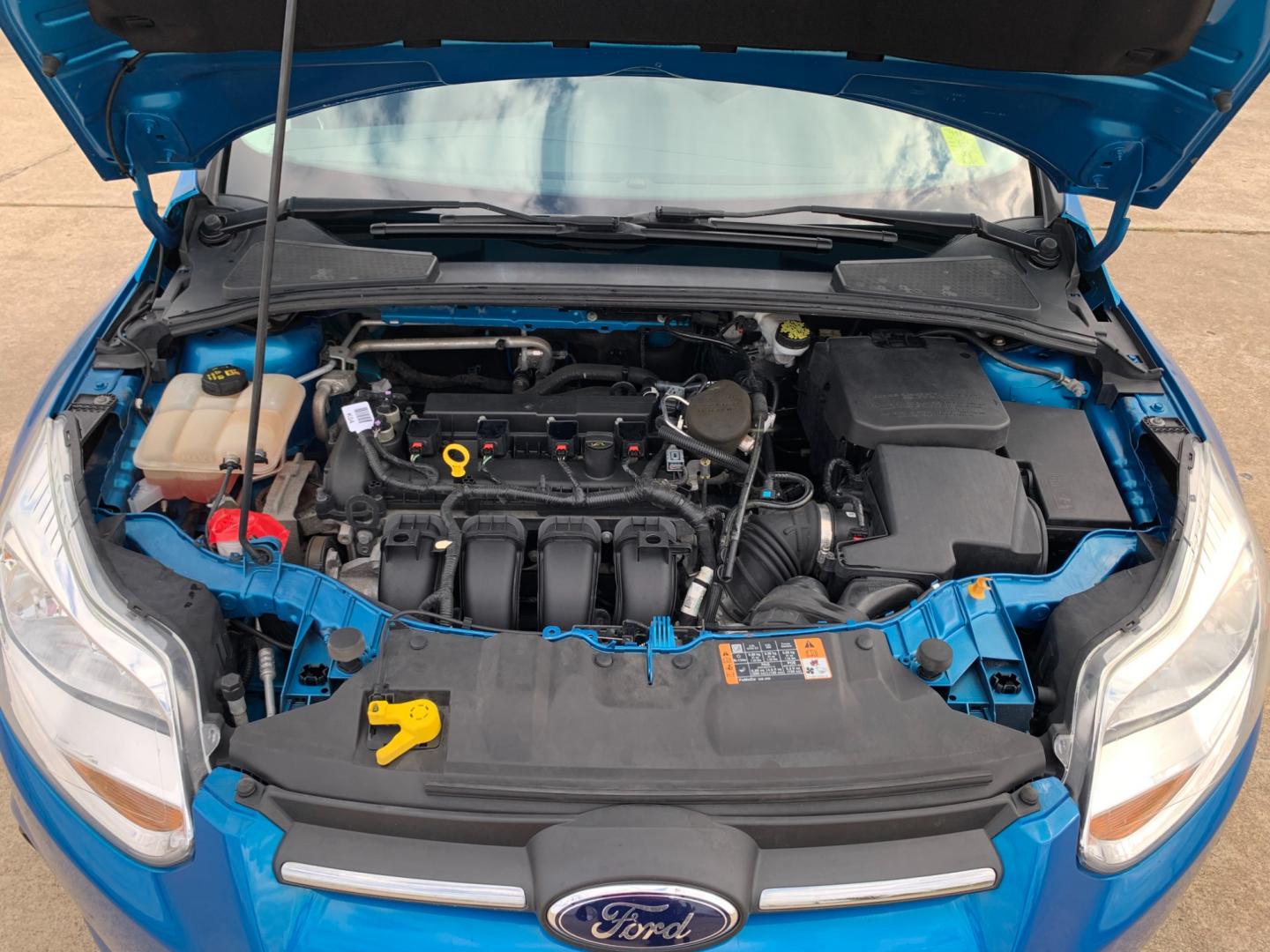 2014 BLUE Ford Focus SE Sedan (1FADP3F25EL) with an 2.0L L4 DOHC 16V engine, AUTOMATIC transmission, located at 17760 Hwy 62, Morris, OK, 74445, (918) 733-4887, 35.609104, -95.877060 - Photo#16