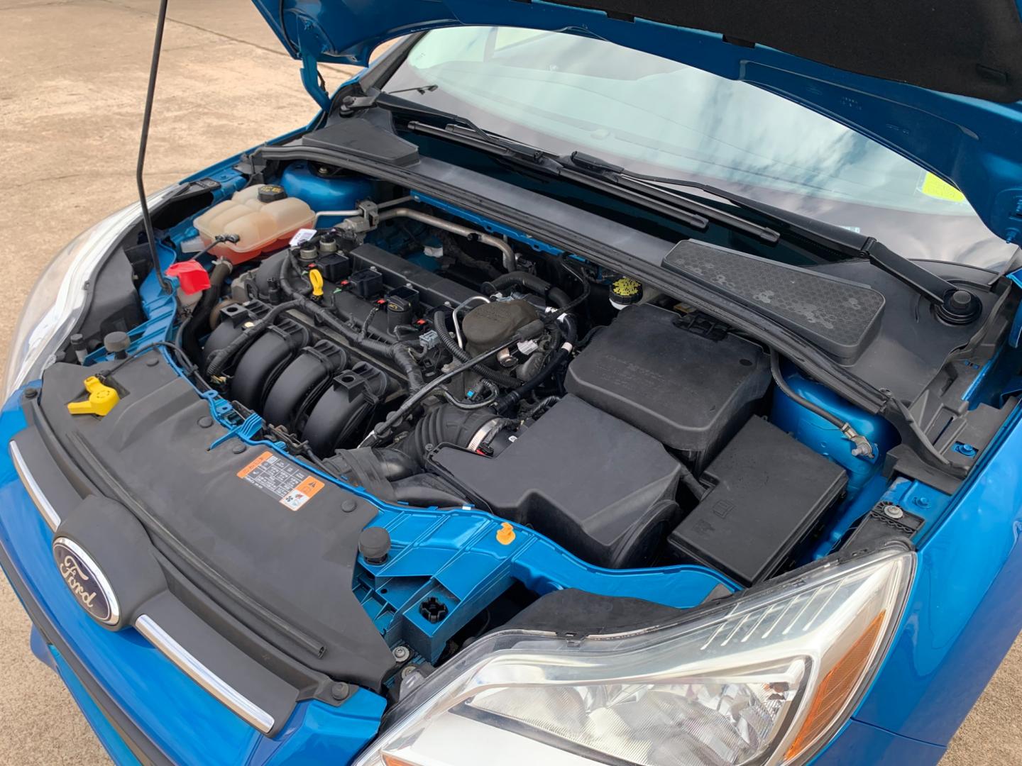2014 BLUE Ford Focus SE Sedan (1FADP3F25EL) with an 2.0L L4 DOHC 16V engine, AUTOMATIC transmission, located at 17760 Hwy 62, Morris, OK, 74445, (918) 733-4887, 35.609104, -95.877060 - Photo#17