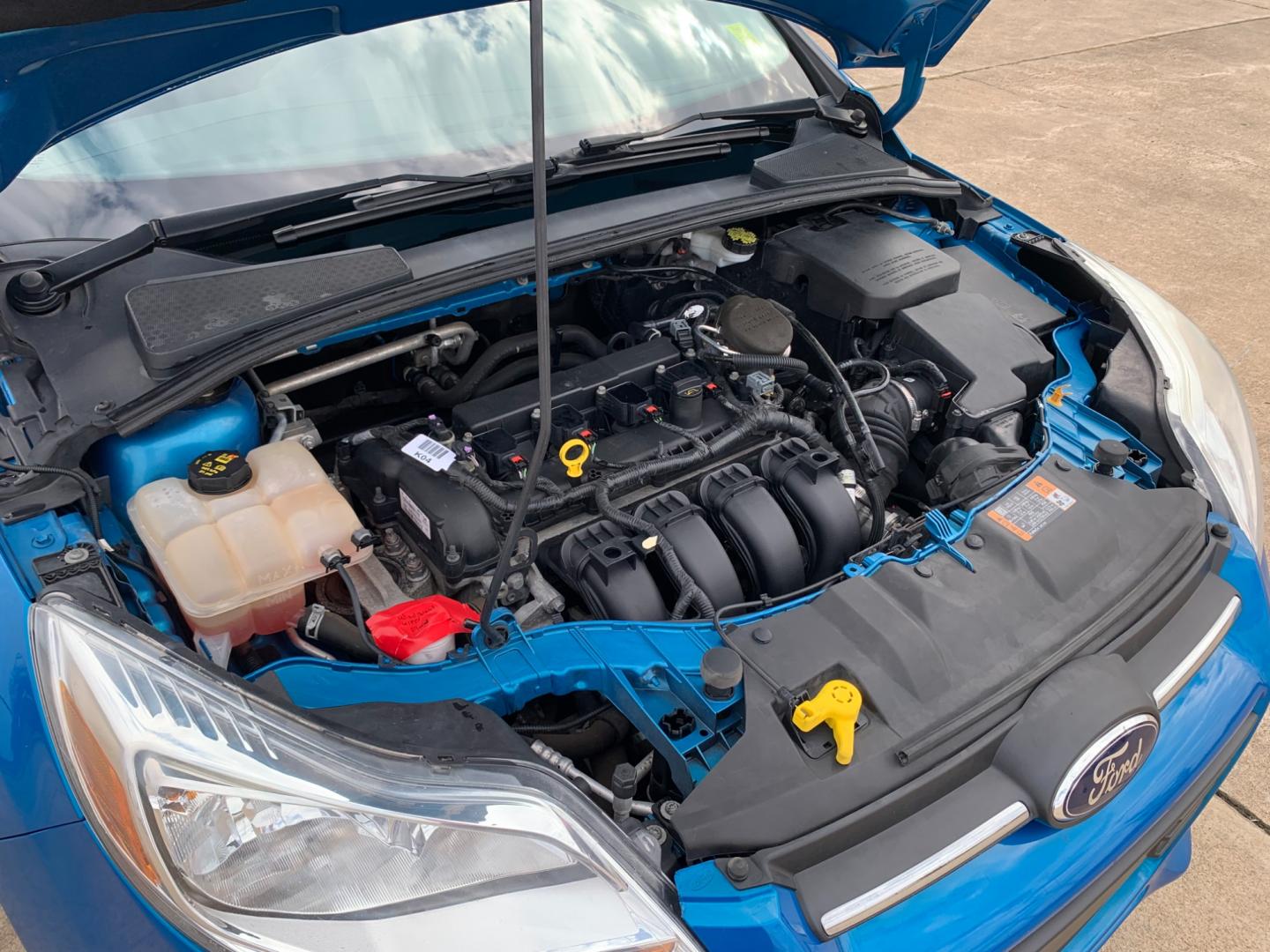 2014 BLUE Ford Focus SE Sedan (1FADP3F25EL) with an 2.0L L4 DOHC 16V engine, AUTOMATIC transmission, located at 17760 Hwy 62, Morris, OK, 74445, (918) 733-4887, 35.609104, -95.877060 - Photo#18