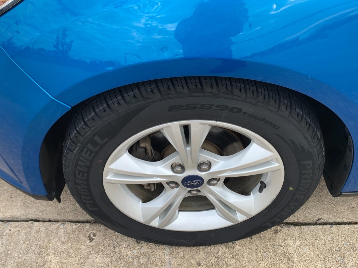 2014 BLUE Ford Focus SE Sedan (1FADP3F25EL) with an 2.0L L4 DOHC 16V engine, AUTOMATIC transmission, located at 17760 Hwy 62, Morris, OK, 74445, (918) 733-4887, 35.609104, -95.877060 - Photo#20