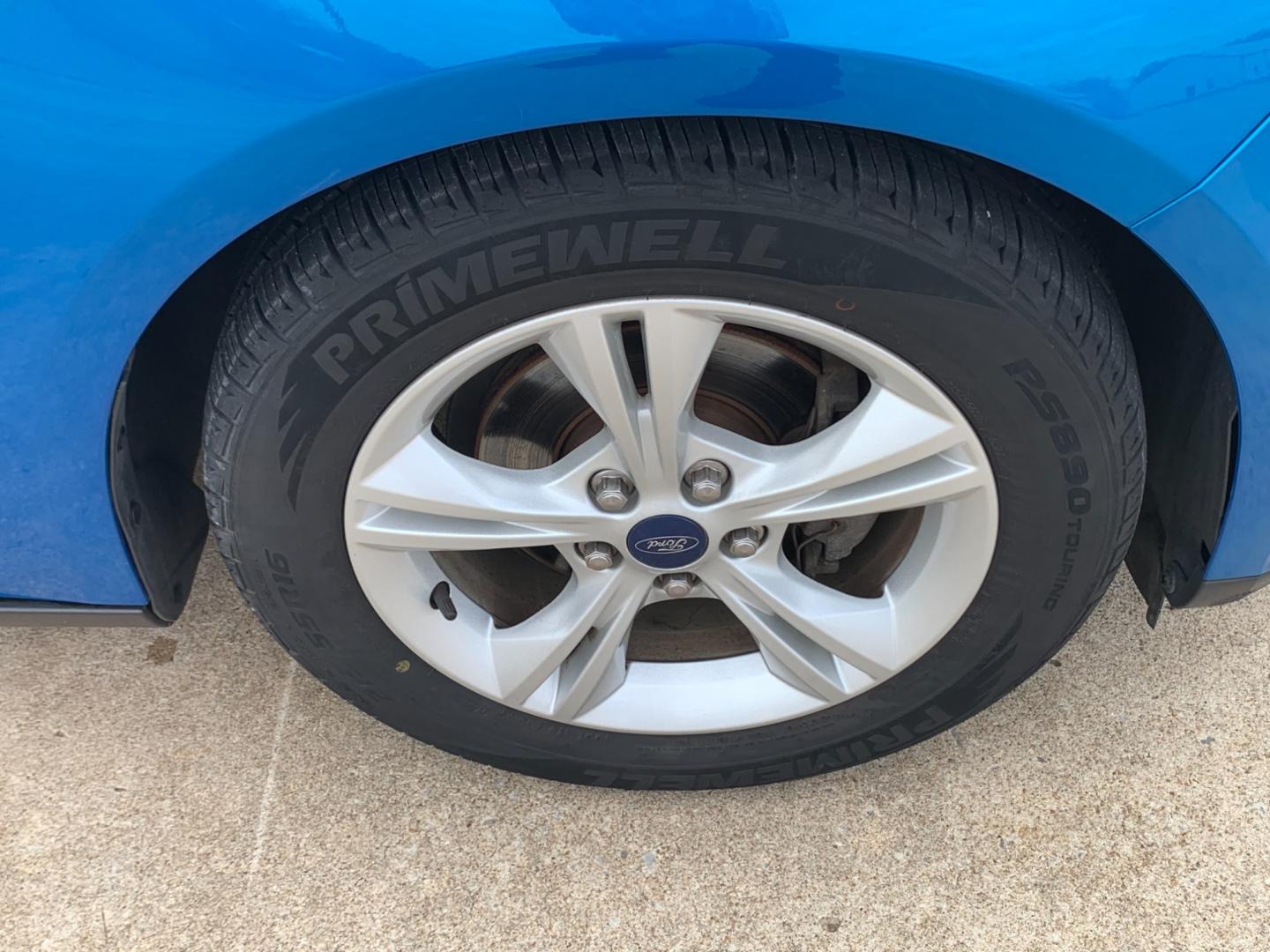 2014 BLUE Ford Focus SE Sedan (1FADP3F25EL) with an 2.0L L4 DOHC 16V engine, AUTOMATIC transmission, located at 17760 Hwy 62, Morris, OK, 74445, (918) 733-4887, 35.609104, -95.877060 - Photo#21