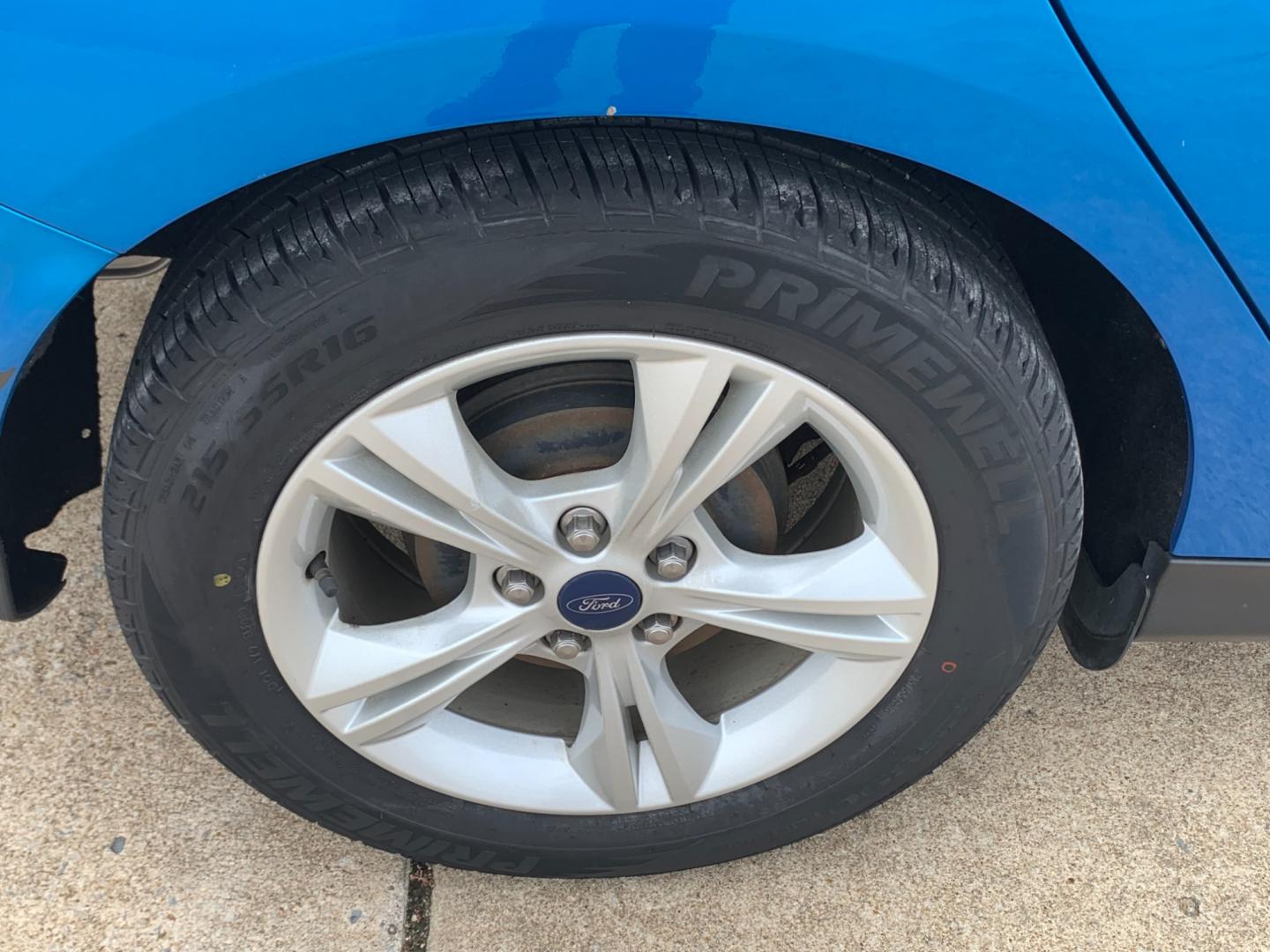 2014 BLUE Ford Focus SE Sedan (1FADP3F25EL) with an 2.0L L4 DOHC 16V engine, AUTOMATIC transmission, located at 17760 Hwy 62, Morris, OK, 74445, (918) 733-4887, 35.609104, -95.877060 - Photo#22