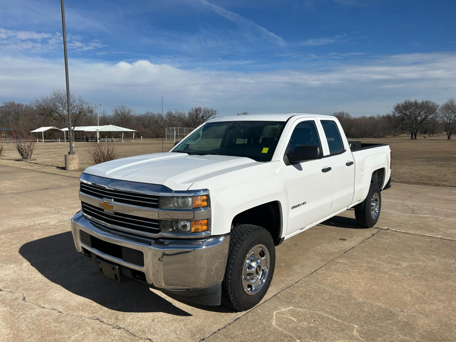 2015 White Chevrolet Silverado 2500HD Work Truck Double Cab 2WD (1GC2CUEB5FZ) with an 6.0L V8 OHV 16V CNG engine, 6A transmission, located at 17760 Hwy 62, Morris, OK, 74445, (918) 733-4887, 35.609104, -95.877060 - 2015 CHEVY SILVERADO 2500HD HAS THE 6.0L V8 AND IS RWD. THIS IS A BI-FUEL TRUCK THAT RUNS ON BOTH CNG OR GASOLINE, FEATURES REMOTE KEYLESS ENTRY, POWER LOCKS, POWER WINDOWS, POWER MIRRORS, MANUAL SEATS, AM/FM STEREO, USB PORT, AUX PORT, LEATHER SEATS, TRACTION CONTROL, BEDLINER, FACTORY-EQUIPPED TRA - Photo #1