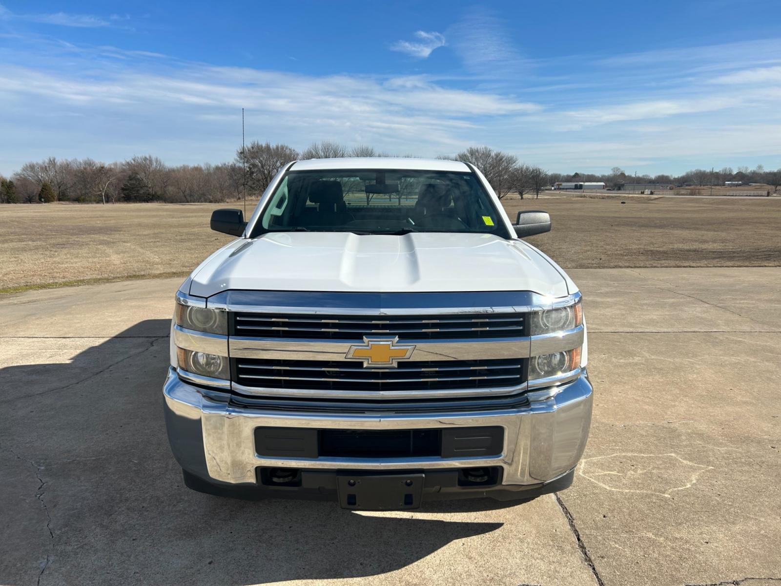 2015 White Chevrolet Silverado 2500HD Work Truck Double Cab 2WD (1GC2CUEB5FZ) with an 6.0L V8 OHV 16V CNG engine, 6A transmission, located at 17760 Hwy 62, Morris, OK, 74445, (918) 733-4887, 35.609104, -95.877060 - 2015 CHEVY SILVERADO 2500HD HAS THE 6.0L V8 AND IS RWD. THIS IS A BI-FUEL TRUCK THAT RUNS ON BOTH CNG OR GASOLINE, FEATURES REMOTE KEYLESS ENTRY, POWER LOCKS, POWER WINDOWS, POWER MIRRORS, MANUAL SEATS, AM/FM STEREO, USB PORT, AUX PORT, LEATHER SEATS, TRACTION CONTROL, BEDLINER, FACTORY-EQUIPPED TRA - Photo #2