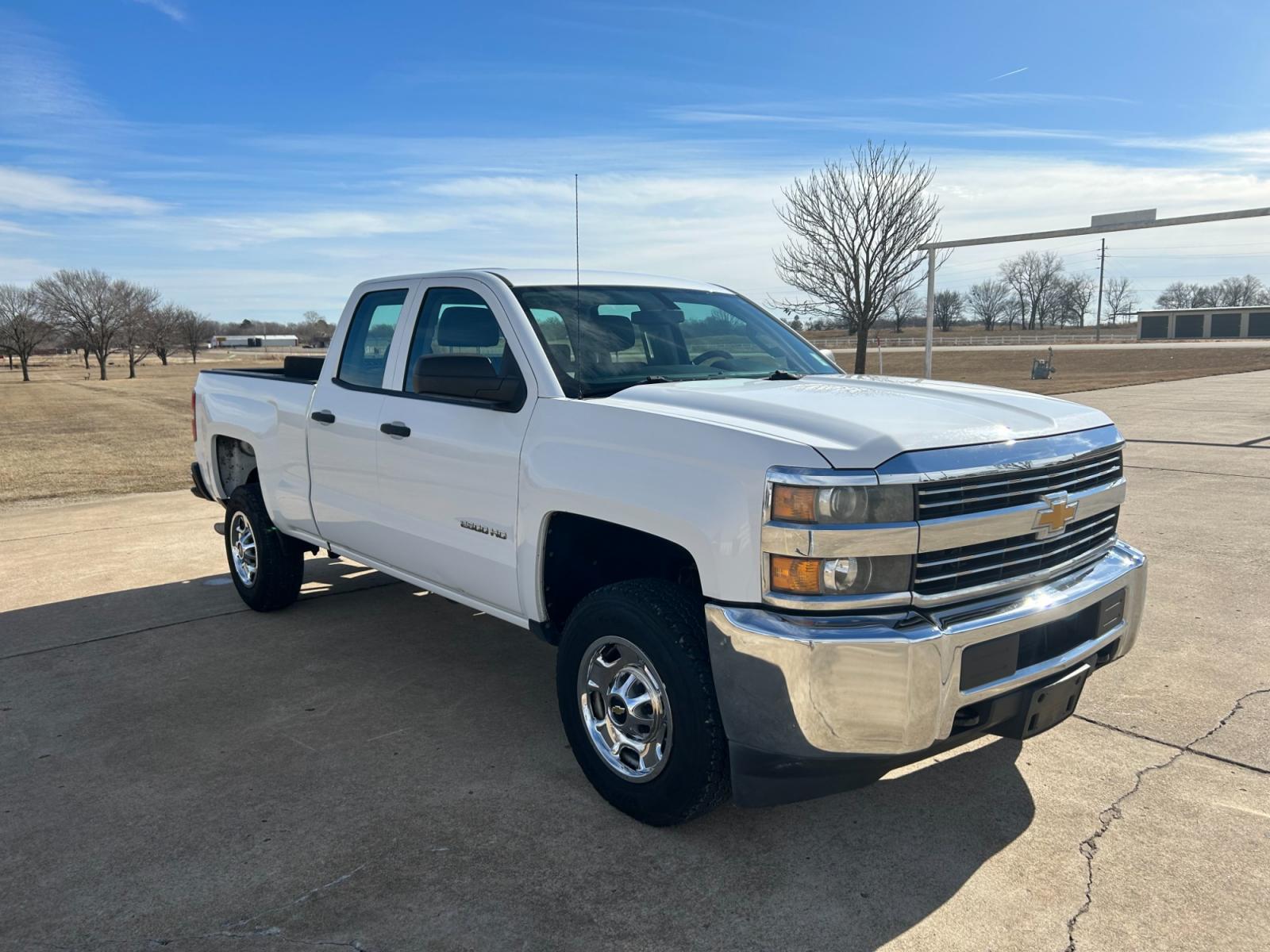 2015 White Chevrolet Silverado 2500HD Work Truck Double Cab 2WD (1GC2CUEB5FZ) with an 6.0L V8 OHV 16V CNG engine, 6A transmission, located at 17760 Hwy 62, Morris, OK, 74445, (918) 733-4887, 35.609104, -95.877060 - 2015 CHEVY SILVERADO 2500HD HAS THE 6.0L V8 AND IS RWD. THIS IS A BI-FUEL TRUCK THAT RUNS ON BOTH CNG OR GASOLINE, FEATURES REMOTE KEYLESS ENTRY, POWER LOCKS, POWER WINDOWS, POWER MIRRORS, MANUAL SEATS, AM/FM STEREO, USB PORT, AUX PORT, LEATHER SEATS, TRACTION CONTROL, BEDLINER, FACTORY-EQUIPPED TRA - Photo #3