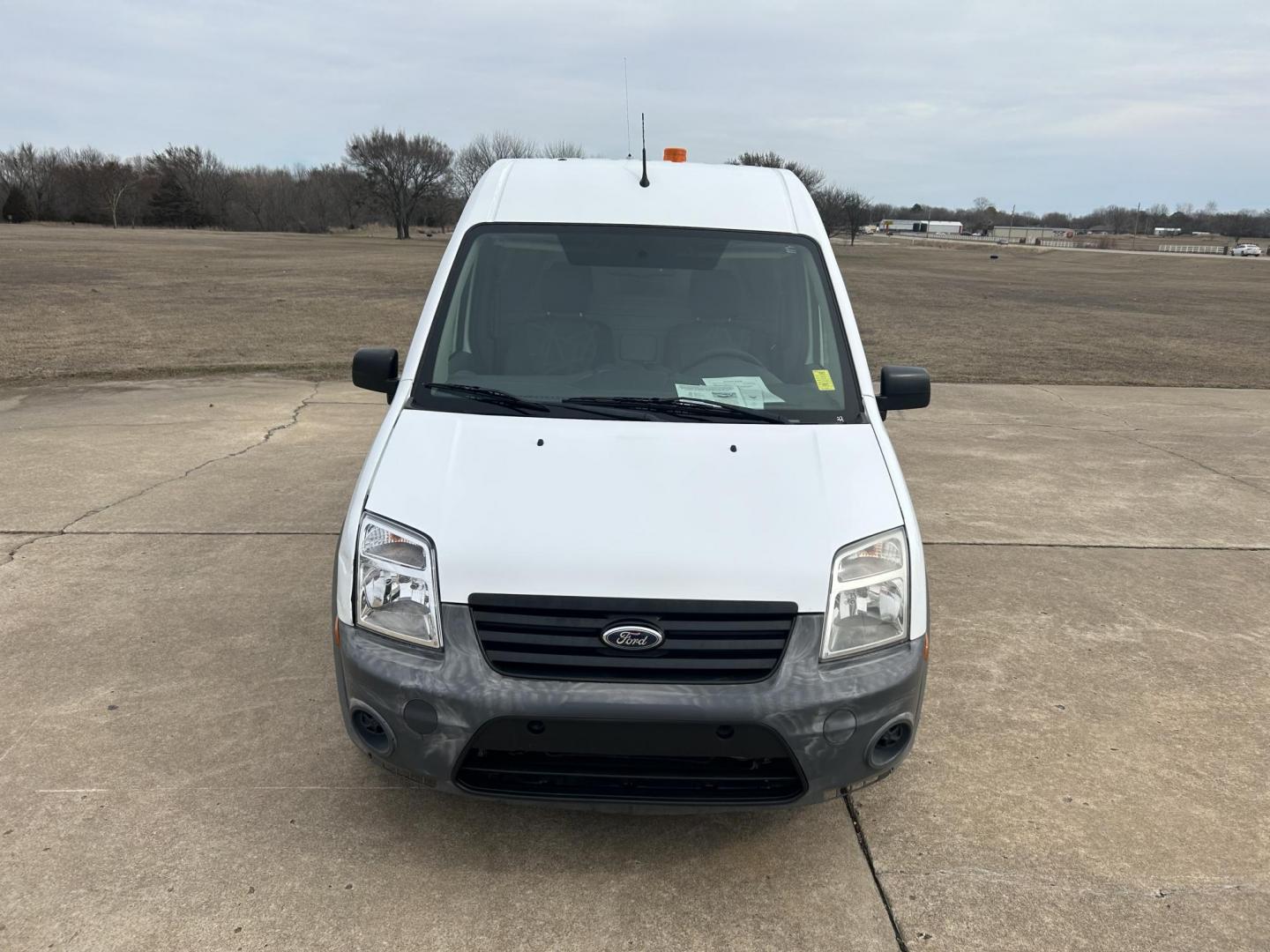 2013 White /Gray Ford Transit Connect XL (NM0LS7AN8DT) with an 2.0L L4 DOHC 16V engine, 4-Speed Automatic transmission, located at 17760 Hwy 62, Morris, OK, 74445, (918) 733-4887, 35.609104, -95.877060 - 2013 FORD TRANSIT CONNECT HAS A 2.0L AND FWD. THIS VAN IS A BI-FUEL THAT RUNS ON BOTH GASOLINE OR COMPRESSED NATURAL GAS (CNG). FEATURES, MANUEL WINDOWS, MANUAL MIRRORS, MANUAL SEATS, CLOTH INTERIOR, MANUAL LOCKS, BACKUP CAMERA, AND AM/FM STEREO. EQUIPPED WITH A BI-FUEL CNG FUEL SYSTEM. IT RUNS ON - Photo#1