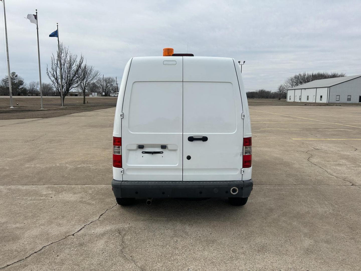2013 White /Gray Ford Transit Connect XL (NM0LS7AN8DT) with an 2.0L L4 DOHC 16V engine, 4-Speed Automatic transmission, located at 17760 Hwy 62, Morris, OK, 74445, (918) 733-4887, 35.609104, -95.877060 - 2013 FORD TRANSIT CONNECT HAS A 2.0L AND FWD. THIS VAN IS A BI-FUEL THAT RUNS ON BOTH GASOLINE OR COMPRESSED NATURAL GAS (CNG). FEATURES, MANUEL WINDOWS, MANUAL MIRRORS, MANUAL SEATS, CLOTH INTERIOR, MANUAL LOCKS, BACKUP CAMERA, AND AM/FM STEREO. EQUIPPED WITH A BI-FUEL CNG FUEL SYSTEM. IT RUNS ON - Photo#4