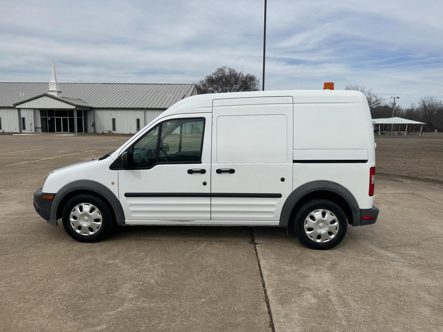 2013 White /Gray Ford Transit Connect XL (NM0LS7AN8DT) with an 2.0L L4 DOHC 16V engine, 4-Speed Automatic transmission, located at 17760 Hwy 62, Morris, OK, 74445, (918) 733-4887, 35.609104, -95.877060 - 2013 FORD TRANSIT CONNECT HAS A 2.0L AND FWD. THIS VAN IS A BI-FUEL THAT RUNS ON BOTH GASOLINE OR COMPRESSED NATURAL GAS (CNG). FEATURES, MANUEL WINDOWS, MANUAL MIRRORS, MANUAL SEATS, CLOTH INTERIOR, MANUAL LOCKS, BACKUP CAMERA, AND AM/FM STEREO. EQUIPPED WITH A BI-FUEL CNG FUEL SYSTEM. IT RUNS ON - Photo#6