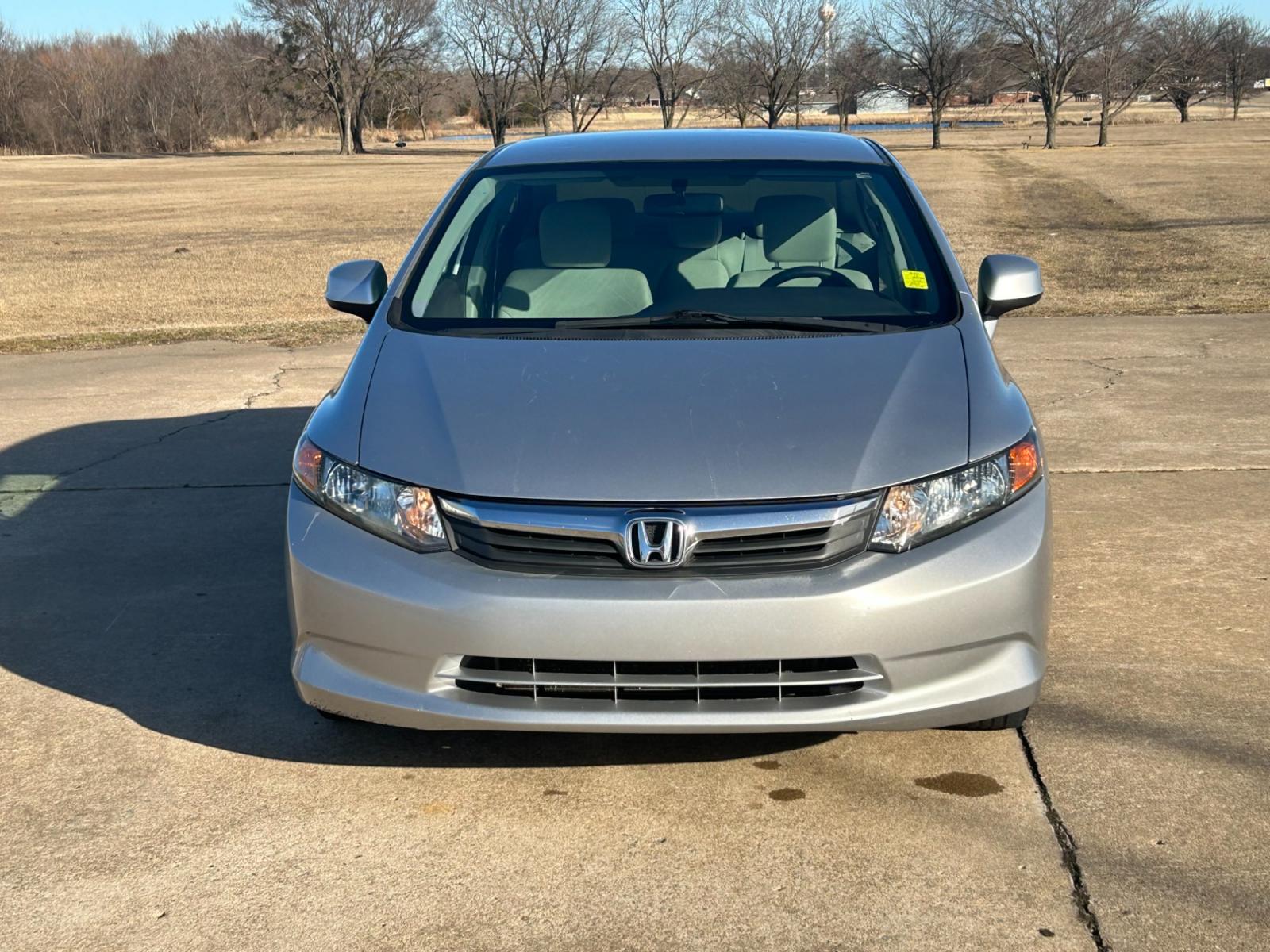 2012 Silver Honda Civic CNG Sedan 5-Speed AT (19XFB5F59CE) with an 1.8L L4 SOHC 16V CNG engine, 5-Speed Automatic transmission, located at 17760 Hwy 62, Morris, OK, 74445, (918) 733-4887, 35.609104, -95.877060 - Photo #2