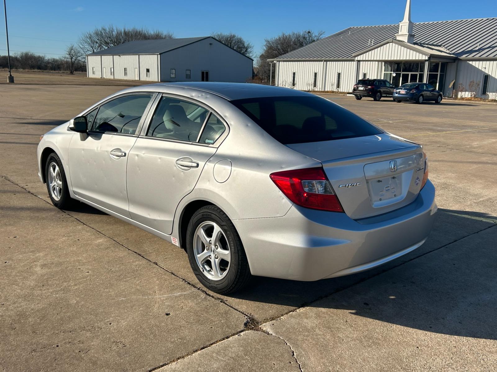 2012 Silver Honda Civic CNG Sedan 5-Speed AT (19XFB5F59CE) with an 1.8L L4 SOHC 16V CNG engine, 5-Speed Automatic transmission, located at 17760 Hwy 62, Morris, OK, 74445, (918) 733-4887, 35.609104, -95.877060 - 2012 HONDA CIVIC 1.8L FWD DEDICATED CNG (COMPRESSED NATURAL GAS) VEHICLE. FEATURES 2 KEYS, REMOTE KEYLESS ENTRY, POWER LOCKS, POWER WINDOWS, POWER MIRRORS, MANUEL SEATS, AM/FM RADIO, CD PLAYER, USB, AUX, BLUETOOTH FOR HANDS-FREE CALLING, 12V POWER OUTLET, CRUISE CONTROL, TRACTION CONTROL, CLOTH SEAT - Photo #7