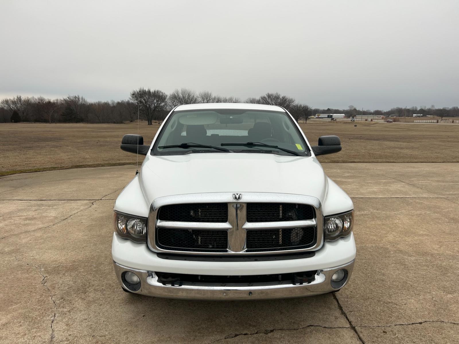 2004 White Dodge Ram 2500 Laramie Quad Cab 2WD (3D7KA28C94G) with an 5.9L L6 OHV 24V TURBO DIESEL engine, located at 17760 Hwy 62, Morris, OK, 74445, (918) 733-4887, 35.609104, -95.877060 - 2004 DODGE RAM HD 2500 HAS A 5.9L TURBO DIESEL AND IS RWD. IT FEATURES A KEYLESS ENTRY REMOTE, POWER LOCKS, POWER WINDOWS, POWER SEATS, POWER MIRRORS, AM/FM STEREO, CD PLAYER, CLOTH INTERIOR, DIGITAL COMPASS, CRUISE CONTROL, CENTURY BED COVER, AND TOW PACKAGE. 267/70R17 COOPER TIRES, 213,344 MILES. - Photo #2
