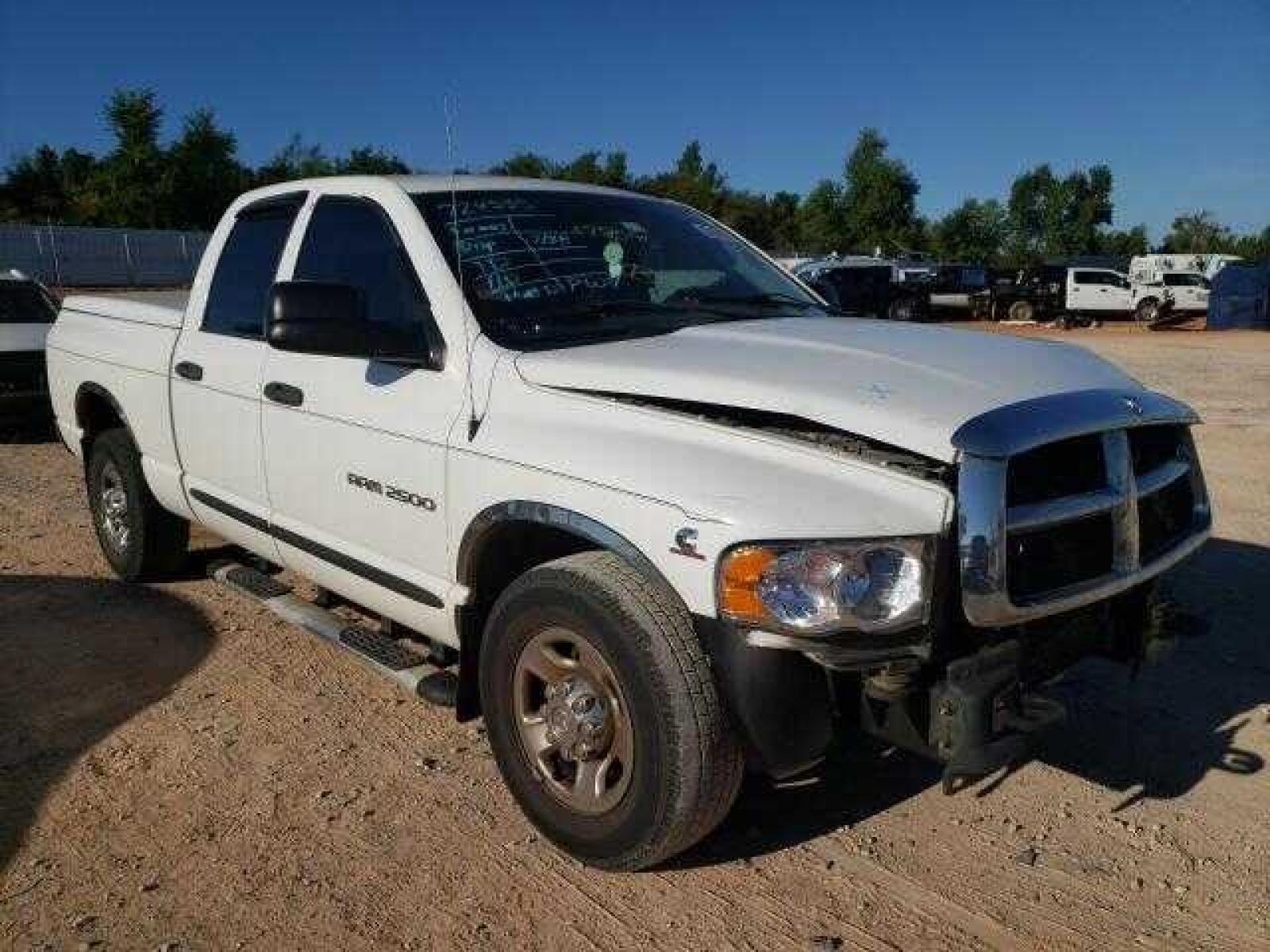 2004 White Dodge Ram 2500 Laramie Quad Cab 2WD (3D7KA28C94G) with an 5.9L L6 OHV 24V TURBO DIESEL engine, located at 17760 Hwy 62, Morris, OK, 74445, (918) 733-4887, 35.609104, -95.877060 - 2004 DODGE RAM HD 2500 HAS A 5.9L TURBO DIESEL AND IS RWD. IT FEATURES A KEYLESS ENTRY REMOTE, POWER LOCKS, POWER WINDOWS, POWER SEATS, POWER MIRRORS, AM/FM STEREO, CD PLAYER, CLOTH INTERIOR, DIGITAL COMPASS, CRUISE CONTROL, CENTURY BED COVER, AND TOW PACKAGE. 267/70R17 COOPER TIRES, 213,344 MILES. - Photo #27