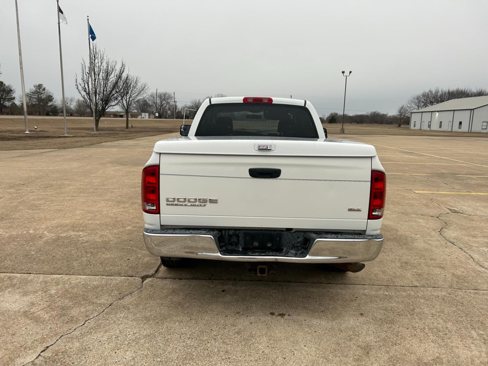 2004 White Dodge Ram 2500 Laramie Quad Cab 2WD (3D7KA28C94G) with an 5.9L L6 OHV 24V TURBO DIESEL engine, located at 17760 Hwy 62, Morris, OK, 74445, (918) 733-4887, 35.609104, -95.877060 - 2004 DODGE RAM HD 2500 HAS A 5.9L TURBO DIESEL AND IS RWD. IT FEATURES A KEYLESS ENTRY REMOTE, POWER LOCKS, POWER WINDOWS, POWER SEATS, POWER MIRRORS, AM/FM STEREO, CD PLAYER, CLOTH INTERIOR, DIGITAL COMPASS, CRUISE CONTROL, CENTURY BED COVER, AND TOW PACKAGE. 267/70R17 COOPER TIRES, 213,344 MILES. - Photo #6