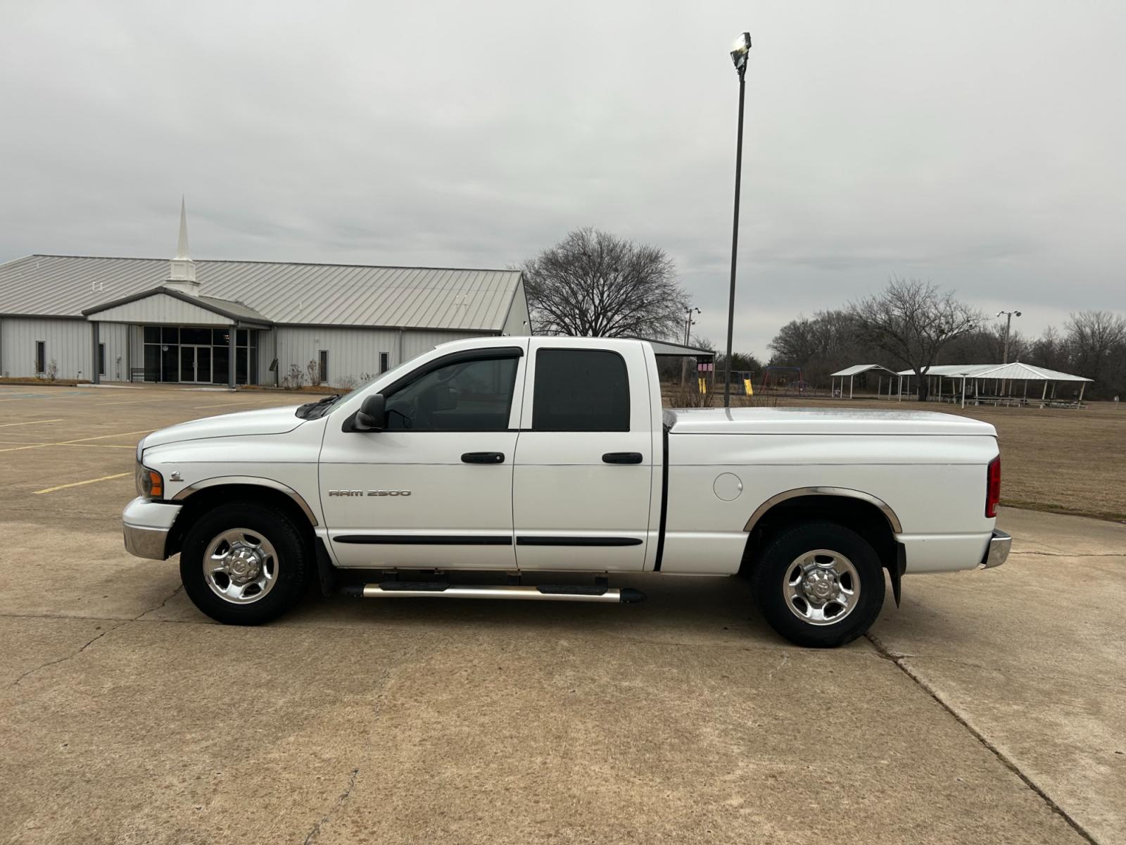 2004 White Dodge Ram 2500 Laramie Quad Cab 2WD (3D7KA28C94G) with an 5.9L L6 OHV 24V TURBO DIESEL engine, located at 17760 Hwy 62, Morris, OK, 74445, (918) 733-4887, 35.609104, -95.877060 - 2004 DODGE RAM HD 2500 HAS A 5.9L TURBO DIESEL AND IS RWD. IT FEATURES A KEYLESS ENTRY REMOTE, POWER LOCKS, POWER WINDOWS, POWER SEATS, POWER MIRRORS, AM/FM STEREO, CD PLAYER, CLOTH INTERIOR, DIGITAL COMPASS, CRUISE CONTROL, CENTURY BED COVER, AND TOW PACKAGE. 267/70R17 COOPER TIRES, 213,344 MILES. - Photo #8