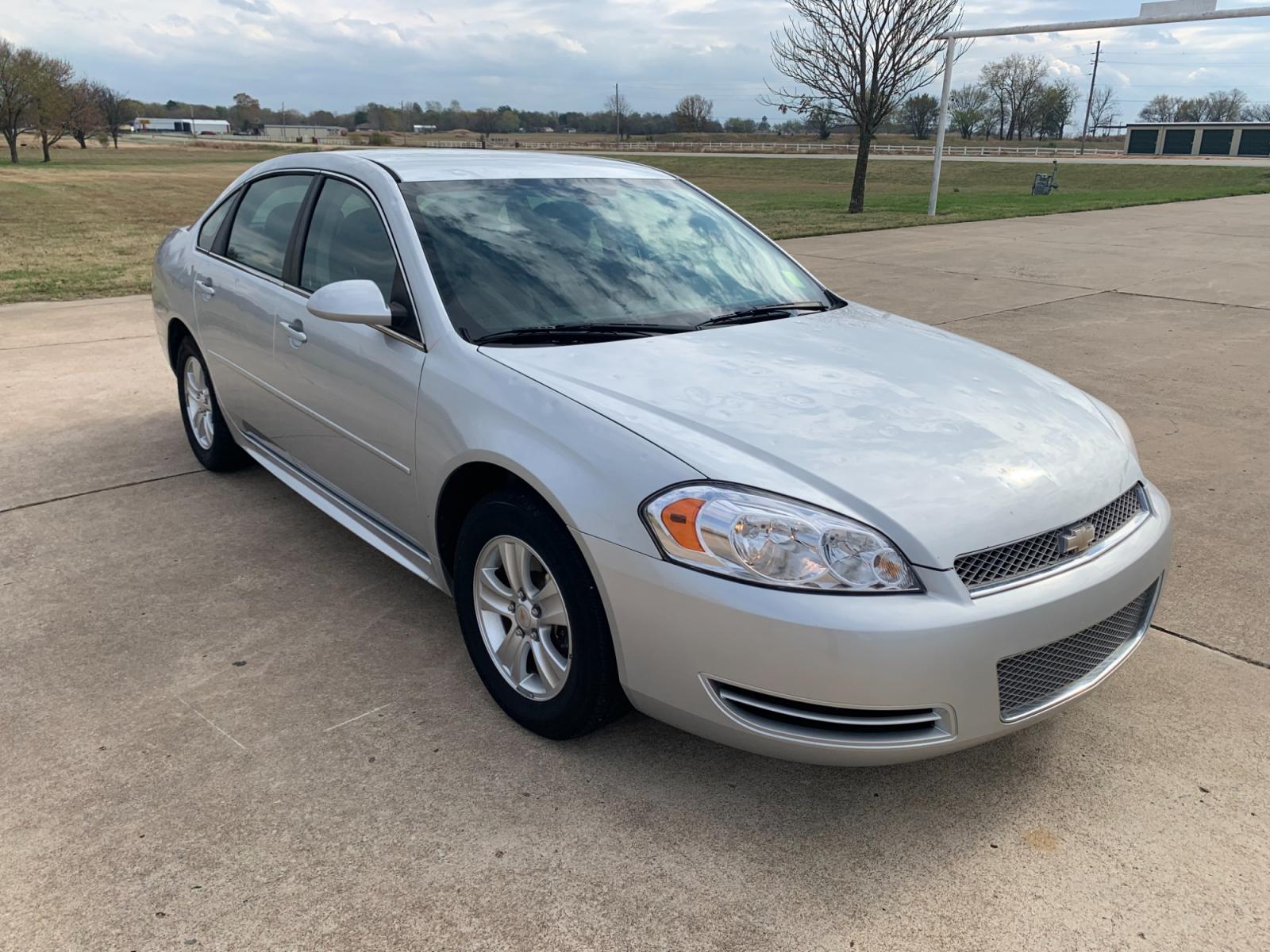 2012 Silver Chevrolet Impala LS (2G1WF5E31C1) with an 3.6L V6 DOHC 16V FFV engine, 6-Speed Automatic transmission, located at 17760 Hwy 62, Morris, OK, 74445, (918) 733-4887, 35.609104, -95.877060 - 2012 CHEVROLET IMPALA LS HS A 3.6L AND IS FWD, FEATURES REMOTE KEYLESS ENTRY, POWER LOCKS, POWER WINDOWS, POWER MIRRORS, AM/FM STEREO, CD PLAYER, AUX PORT, USB PORT, CLOTH INTERIOR, CRUISE CONTROL, TRACTION CONTROL, TILT WHEEL. LOW MILES ONLY 76,032 AND 225/60R16 TIRES. ***DOES HAVE HAIL DAMAGE AS S - Photo #2